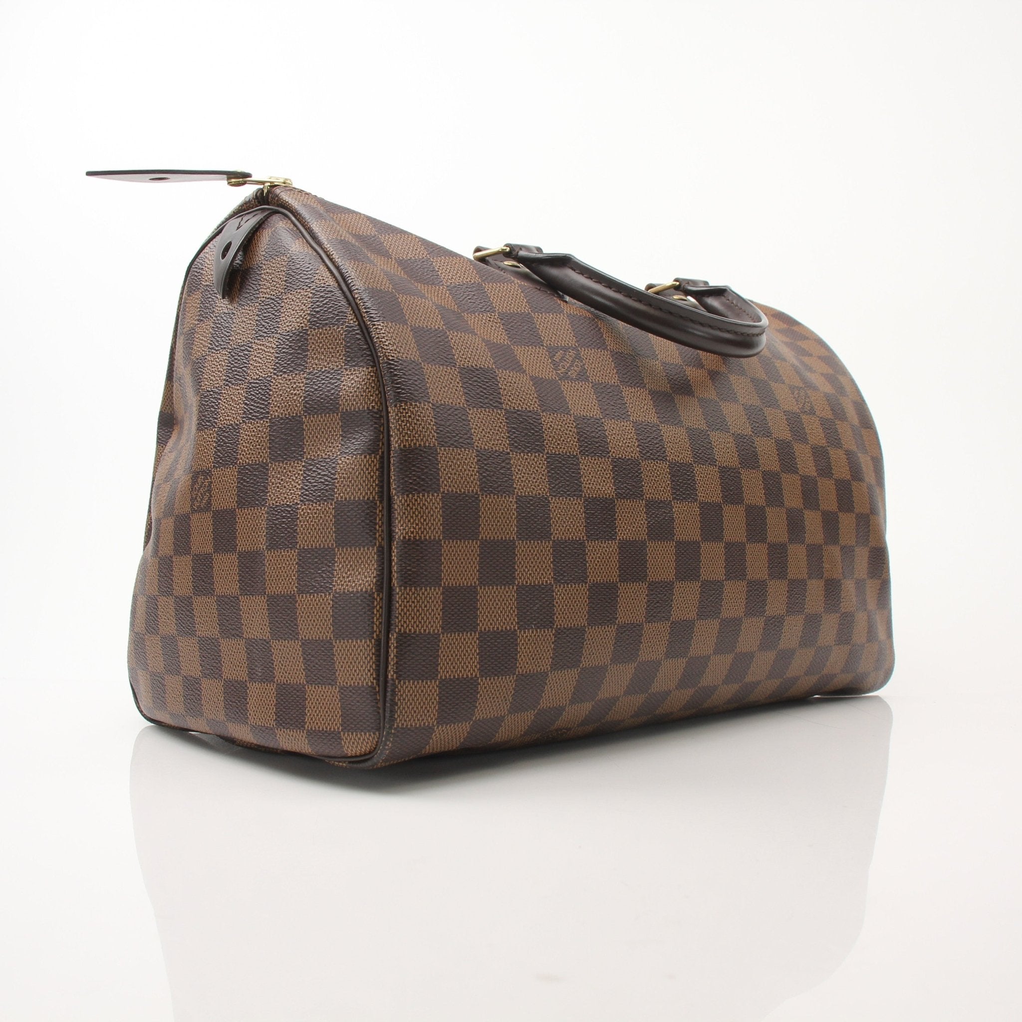 Louis Vuitton Speedy 35 handbag with gold-tone hardware and classic monogram canvas, displayed on a neutral background.