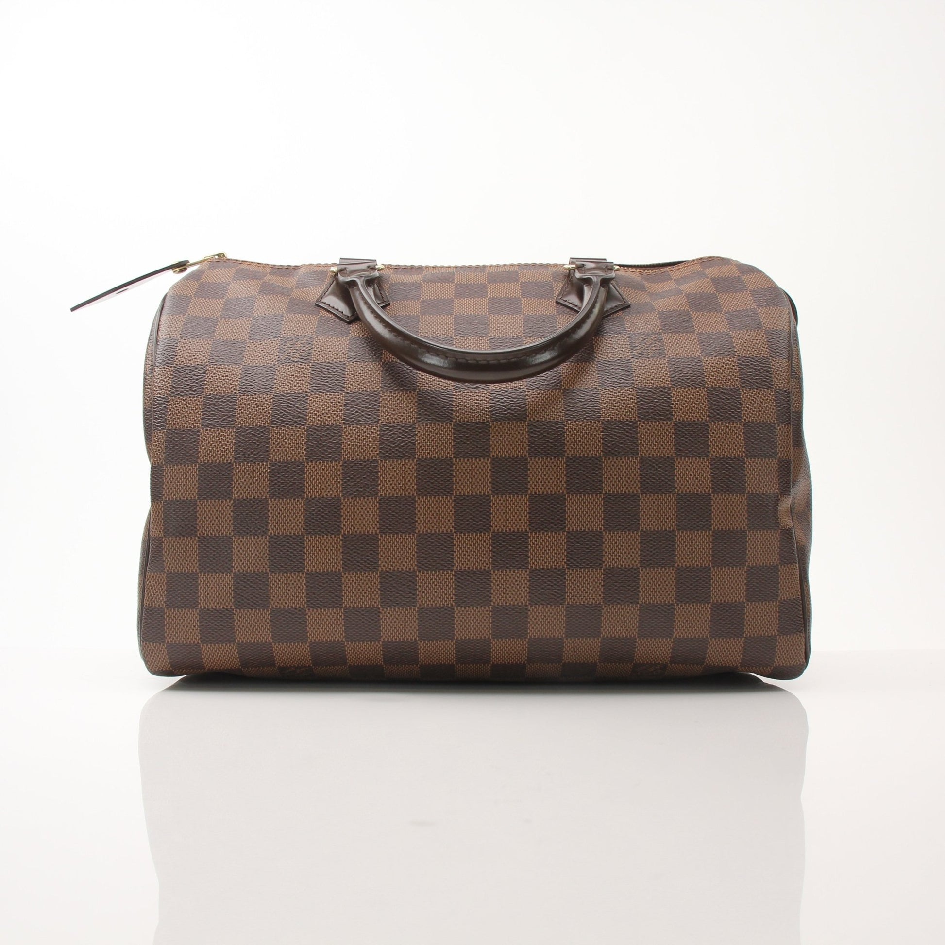 Louis Vuitton Speedy 30 handbag with gold hardware and monogram canvas, crafted by Gold & Beyond.