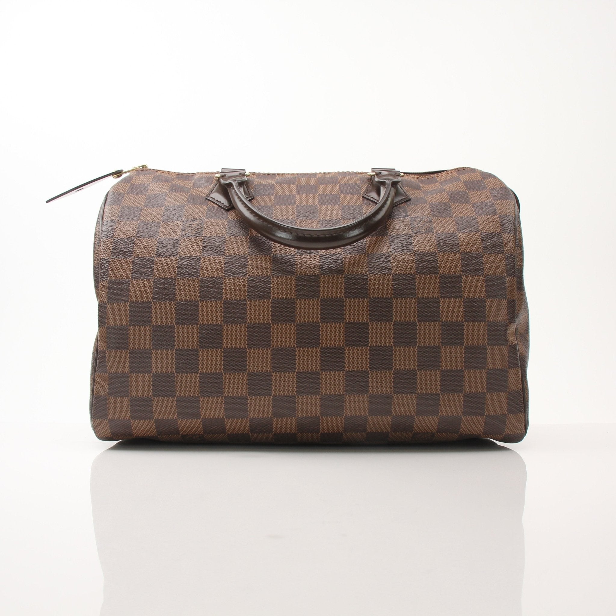 Louis Vuitton Speedy 30 handbag with gold hardware and monogram canvas, crafted by Gold & Beyond.
