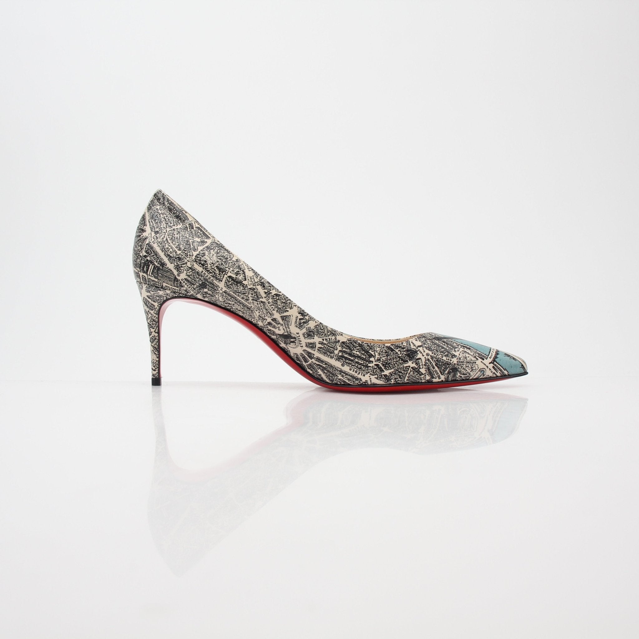 Christian Louboutin Decollete 554 Plan de Paris pumps with gold accents, elegant heel design, and classic pointed toe.