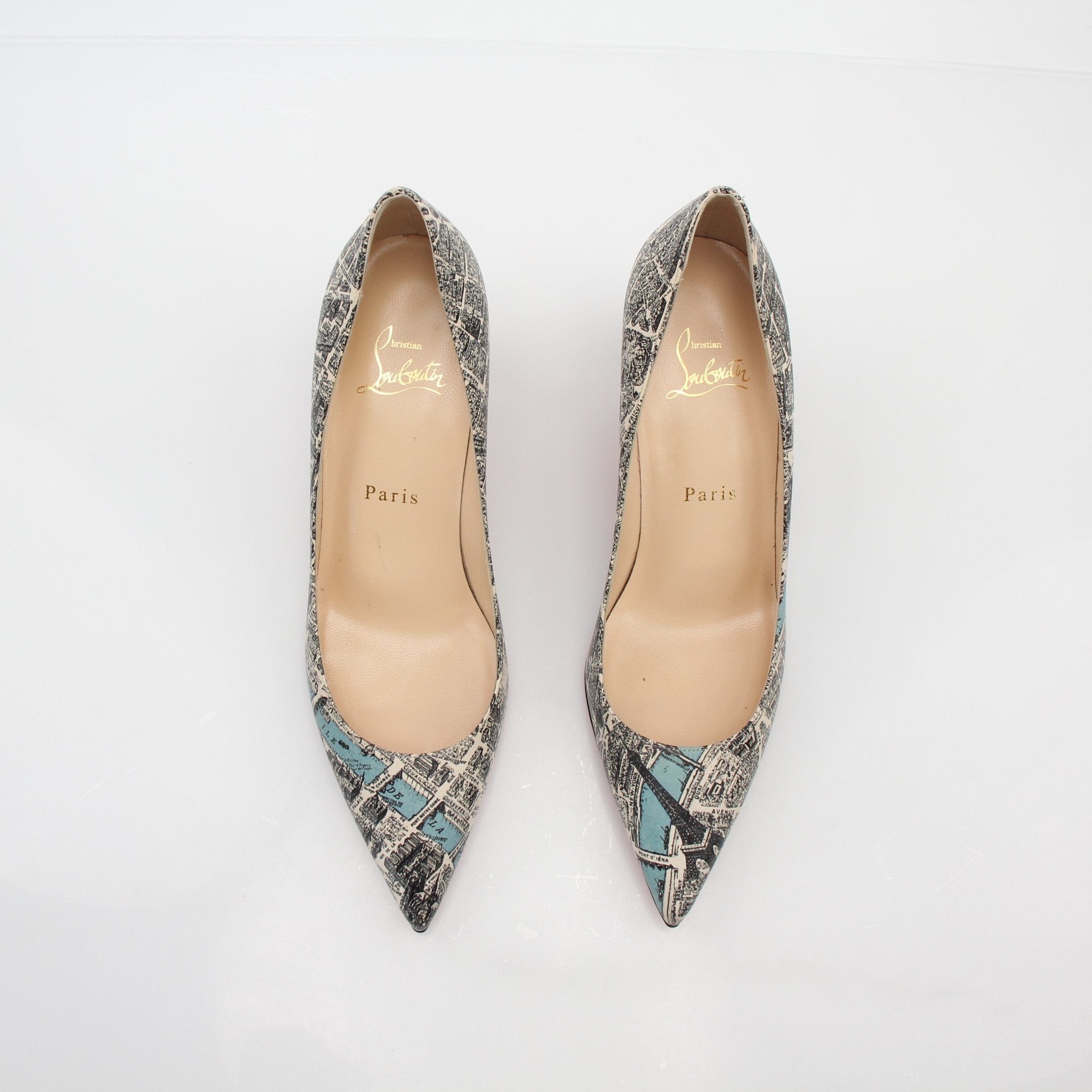 Gold & Beyond Christian Louboutin Decollete 554 Plan de Paris pumps featuring classic heels with red soles and elegant design.