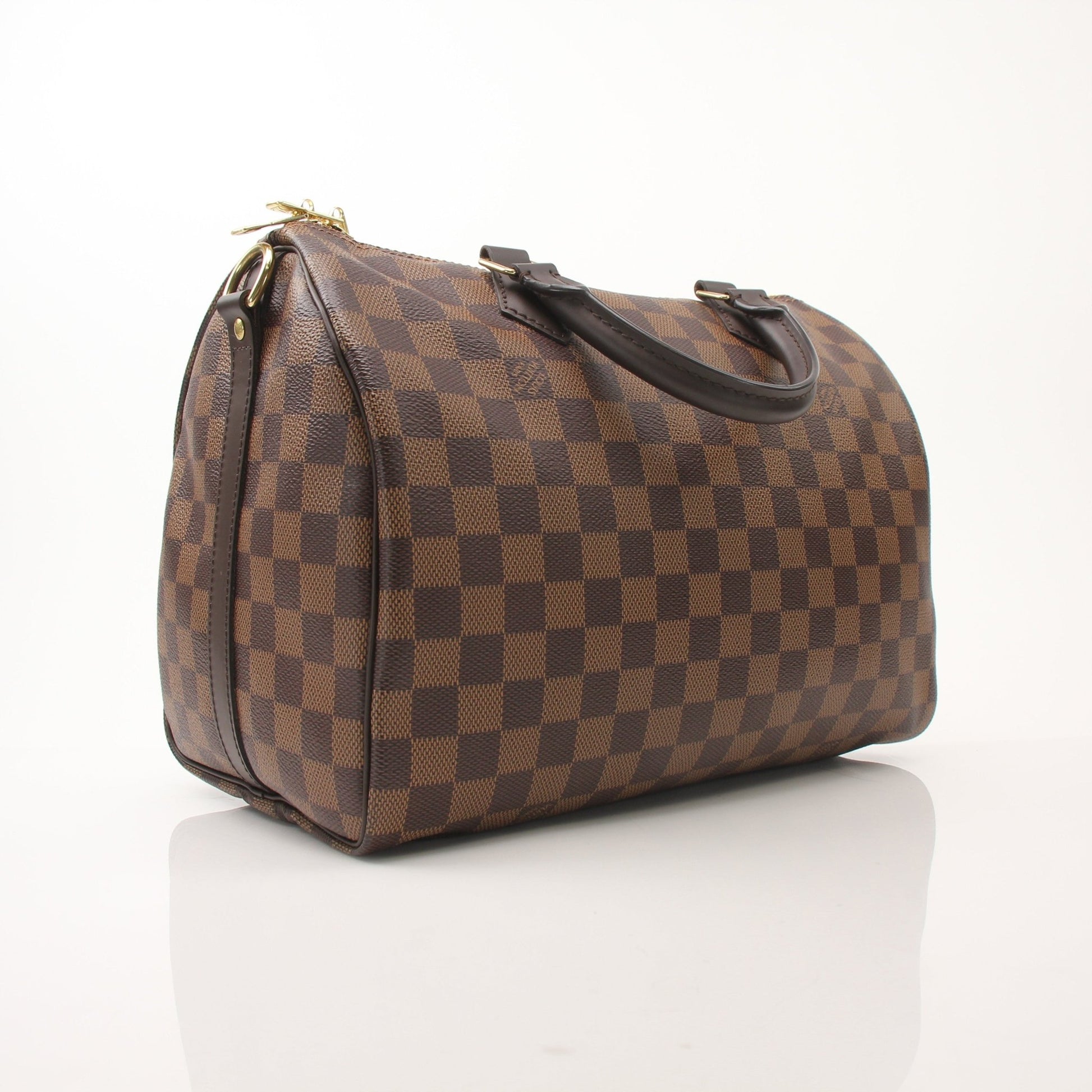 Louis Vuitton Speedy Bandouliere 30 handbag with classic monogram canvas and leather trim, shown with strap and top zipper.