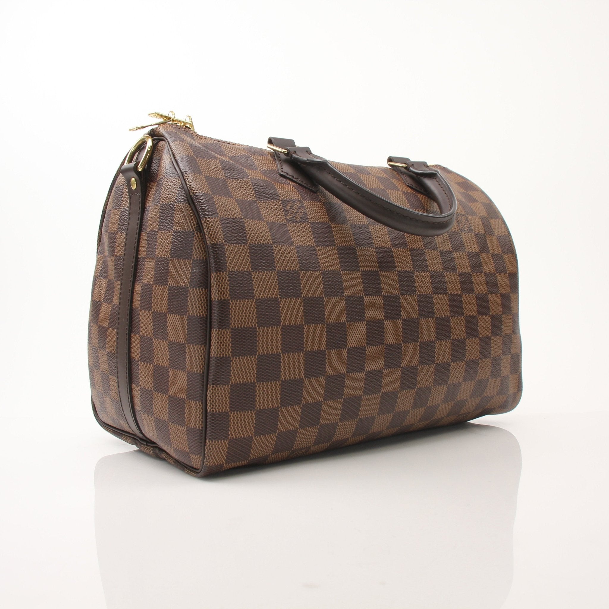 Louis Vuitton Speedy Bandouliere 30 handbag with classic monogram canvas and leather trim, shown with strap and top zipper.