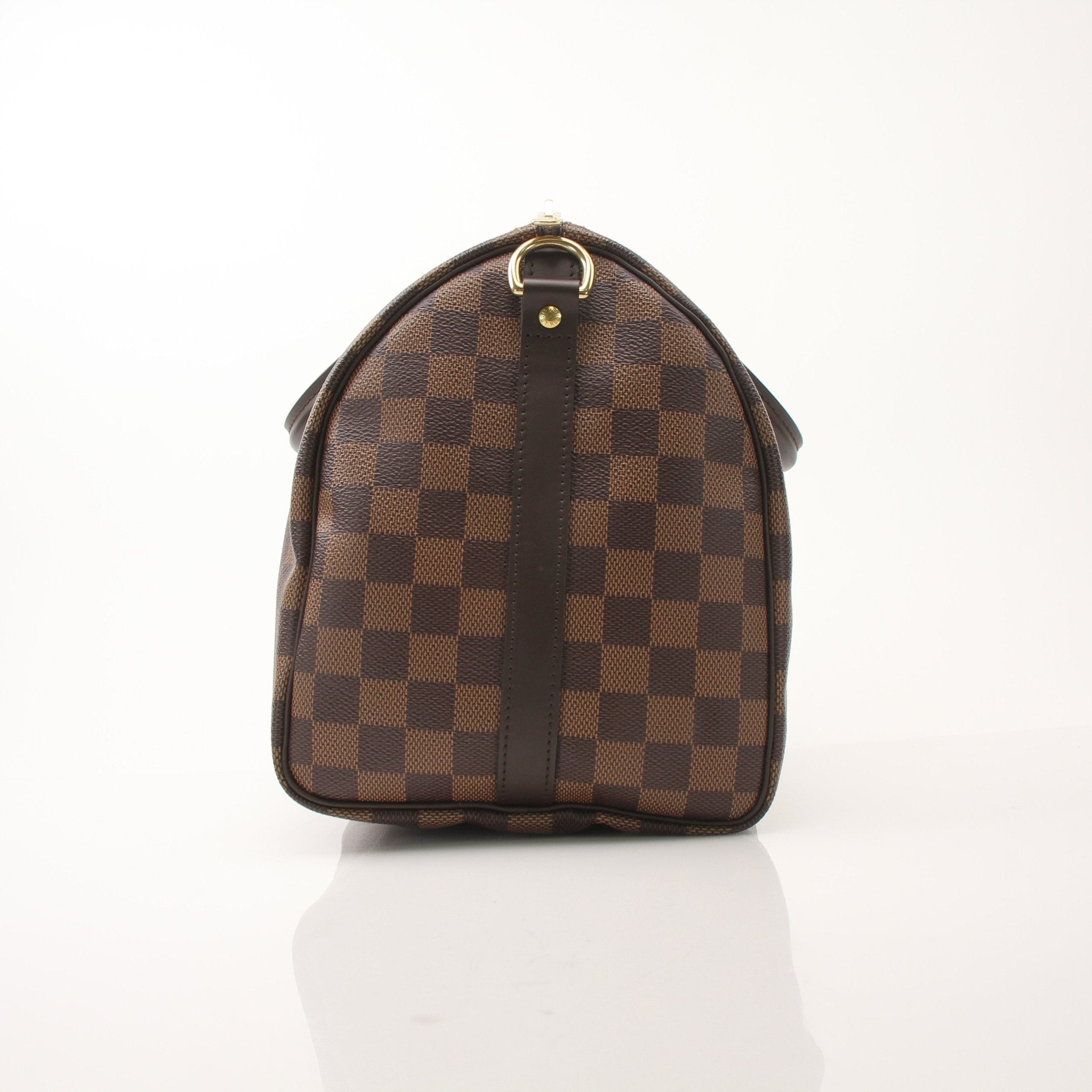 Gold & Beyond Louis Vuitton Speedy Bandouliere 30 handbag with monogram canvas and leather trim, shown with strap and zipper closure.