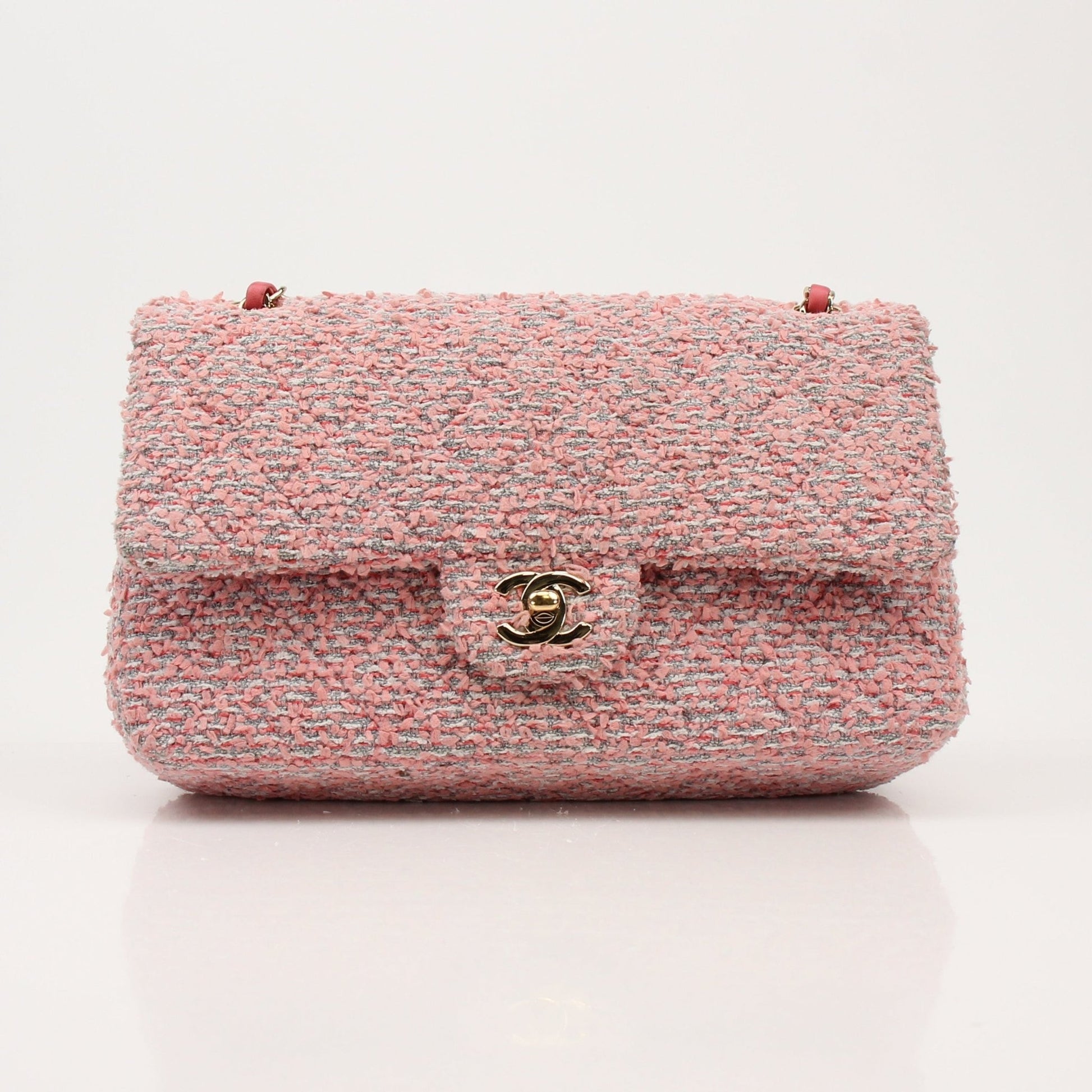 Pink Chanel Tweed Flap Handbag by Gold & Beyond with gold hardware and classic quilted design.
