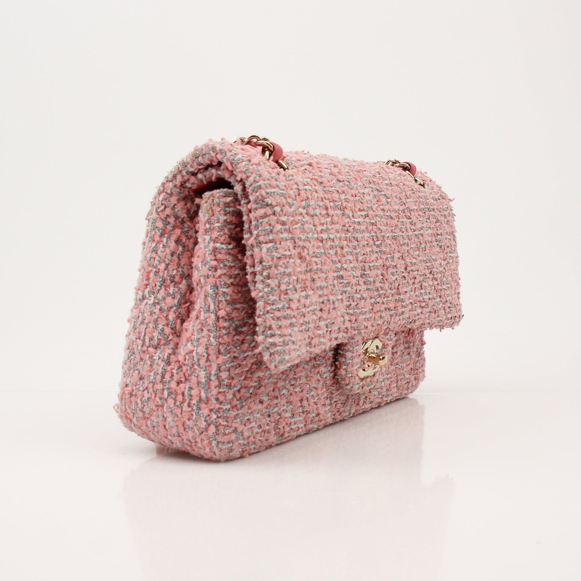 Gold & Beyond Chanel Pink Tweed Flap Bag handbag with gold chain strap and classic tweed fabric.