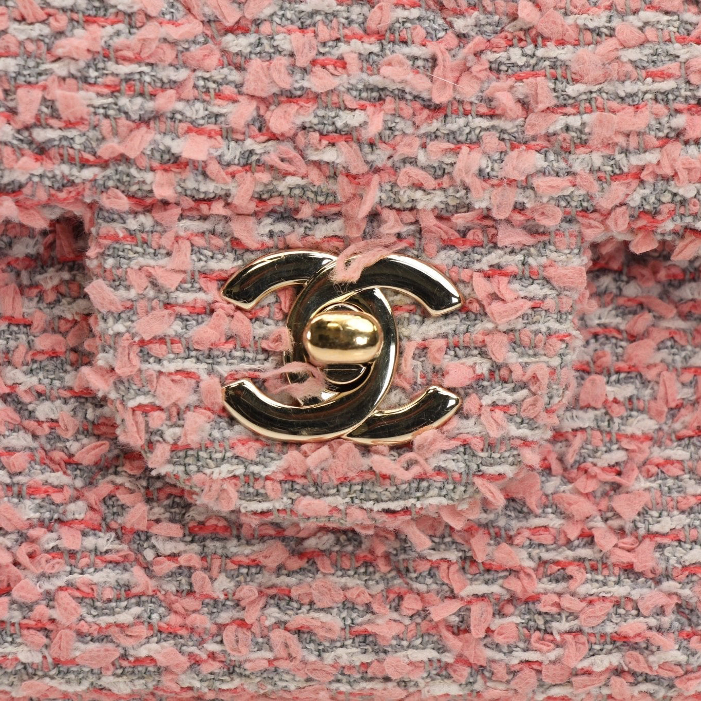 Pink Chanel Tweed Flap Handbag with gold accents, stylish accessory from Gold & Beyond featuring classic quilting and elegant design.