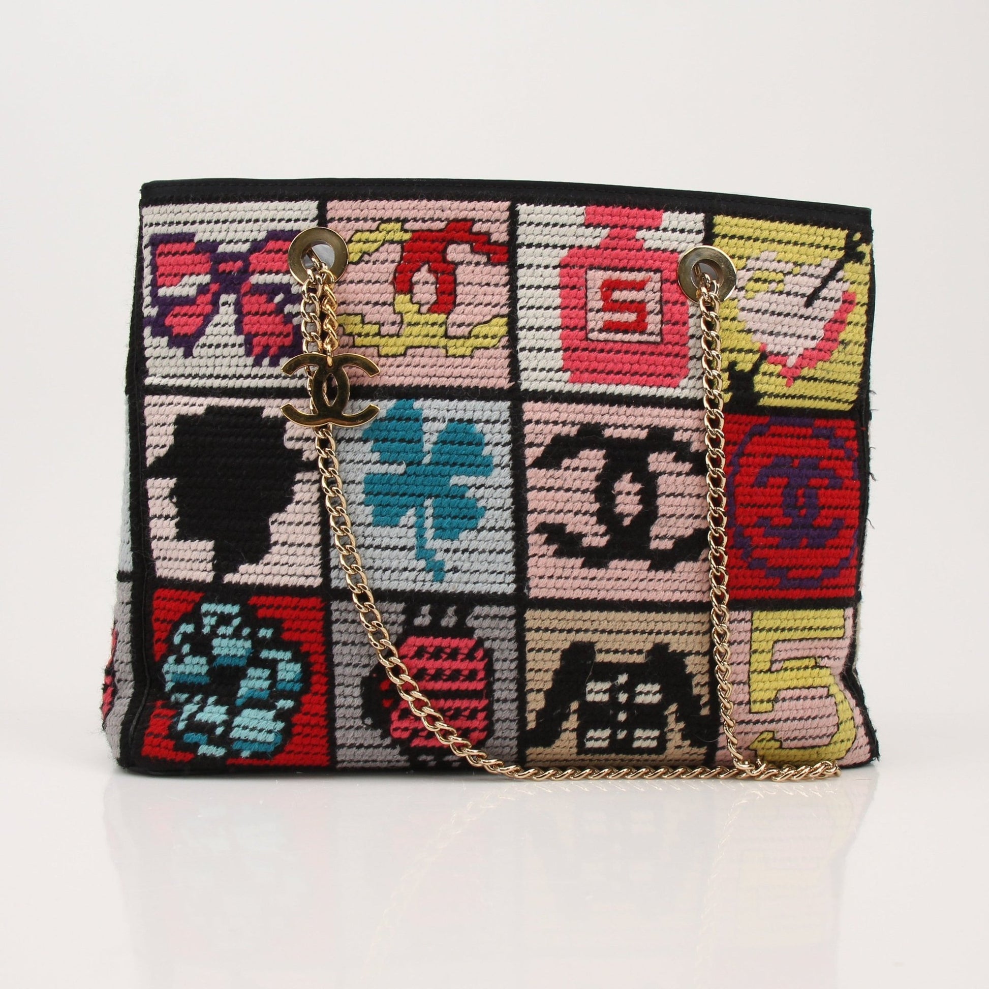 Multicolor embroidered Chanel Precious Symbols tote handbag with gold accents, stylish and spacious for everyday use.