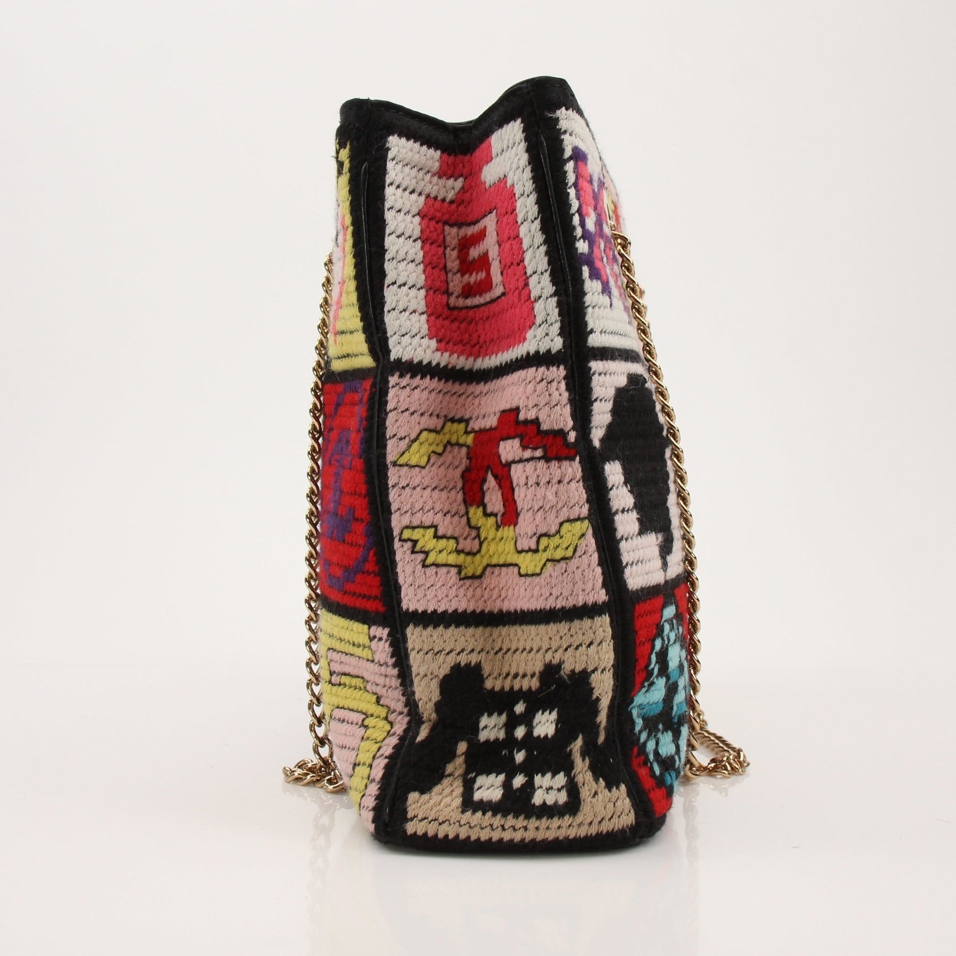 Gold & Beyond Chanel Precious Symbols multicolor embroidered tote bag with intricate floral embroidery and leather handles.