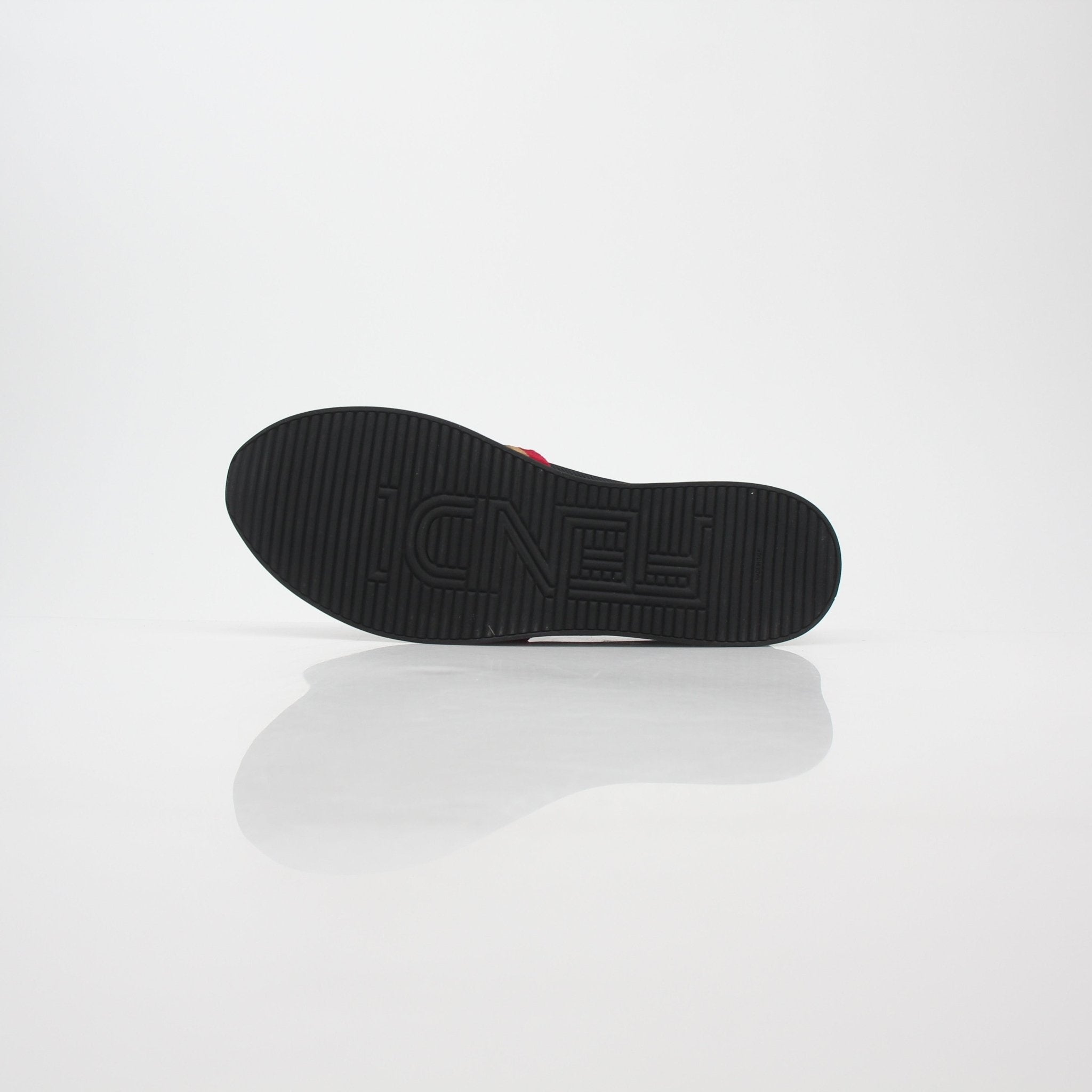 Fendi black and red Zucca FF logo slip-on sneakers with stylish design and comfortable fit, displayed on a clean background.