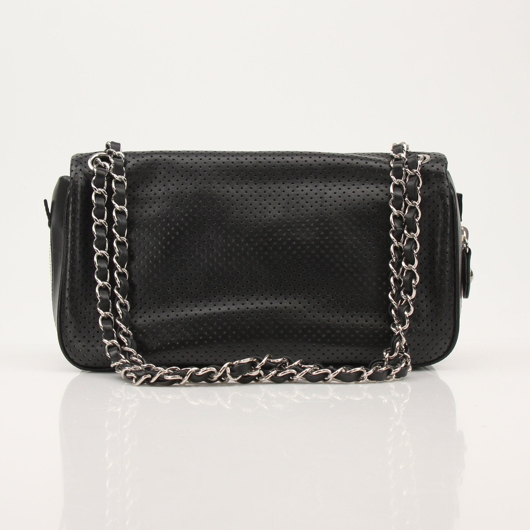 Gold & Beyond Chanel Baseball Spirit Flap Bag handbag with logo details and structured design, styled on a neutral background.