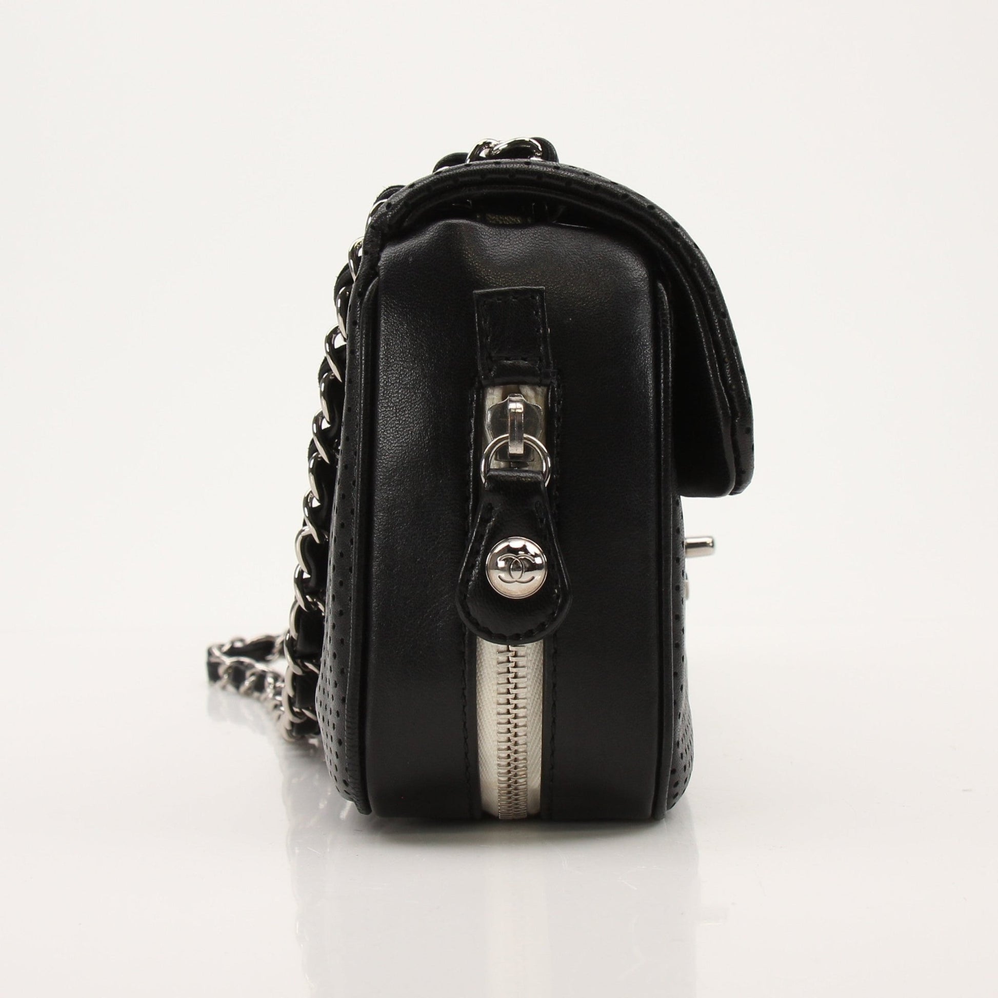 Gold & Beyond Chanel Baseball Spirit Flap Handbag in black with gold accents, featuring a structured design and chain strap.