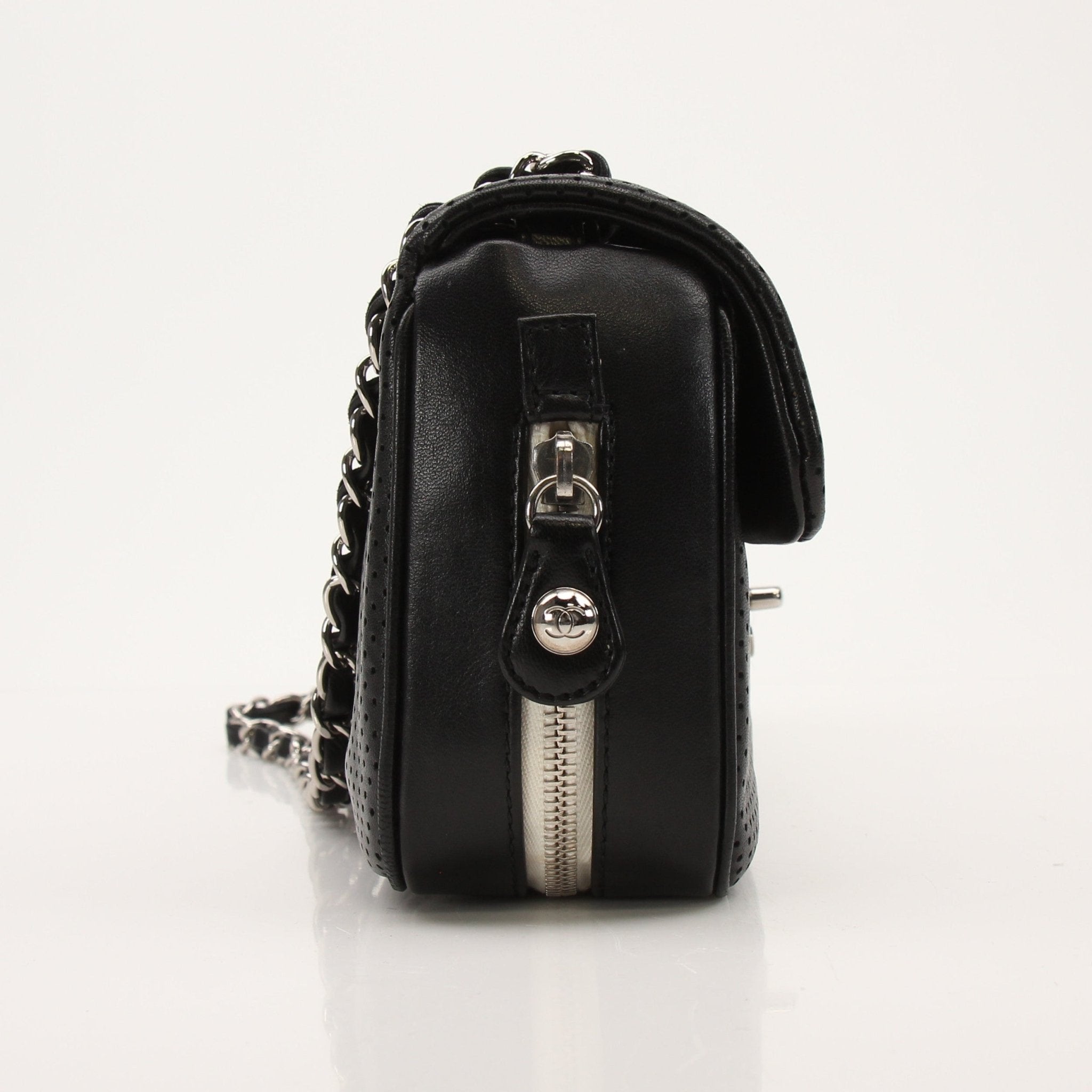 Gold & Beyond Chanel Baseball Spirit Flap Handbag in black with gold accents, featuring a structured design and chain strap.