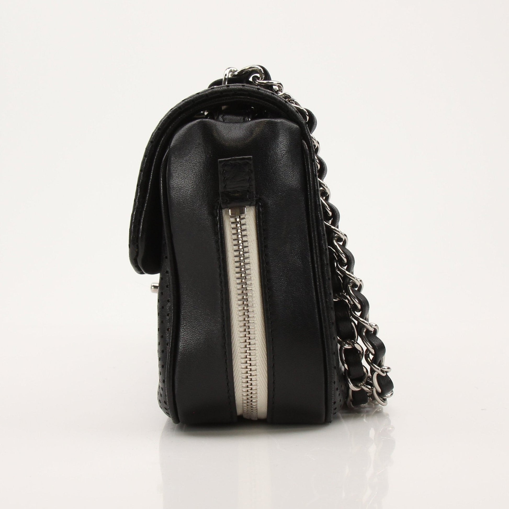Gold & Beyond Chanel Baseball Spirit Flap Bag handbag with gold accents and logo details shown in the image.