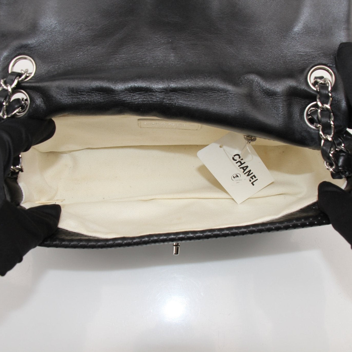 Gold & Beyond Chanel Baseball Spirit Flap Bag handbag with baseball-themed design and gold accents, shown in side view.