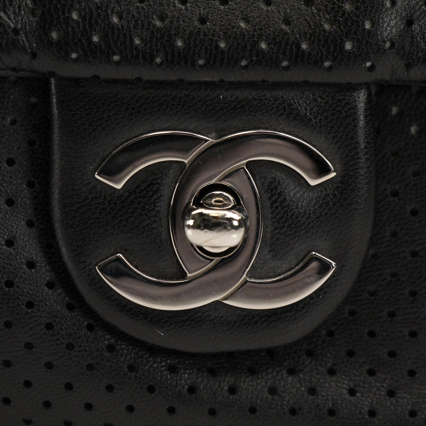 Gold & Beyond Chanel Baseball Spirit Flap Bag handbag with signature quilted design and chain strap on white background