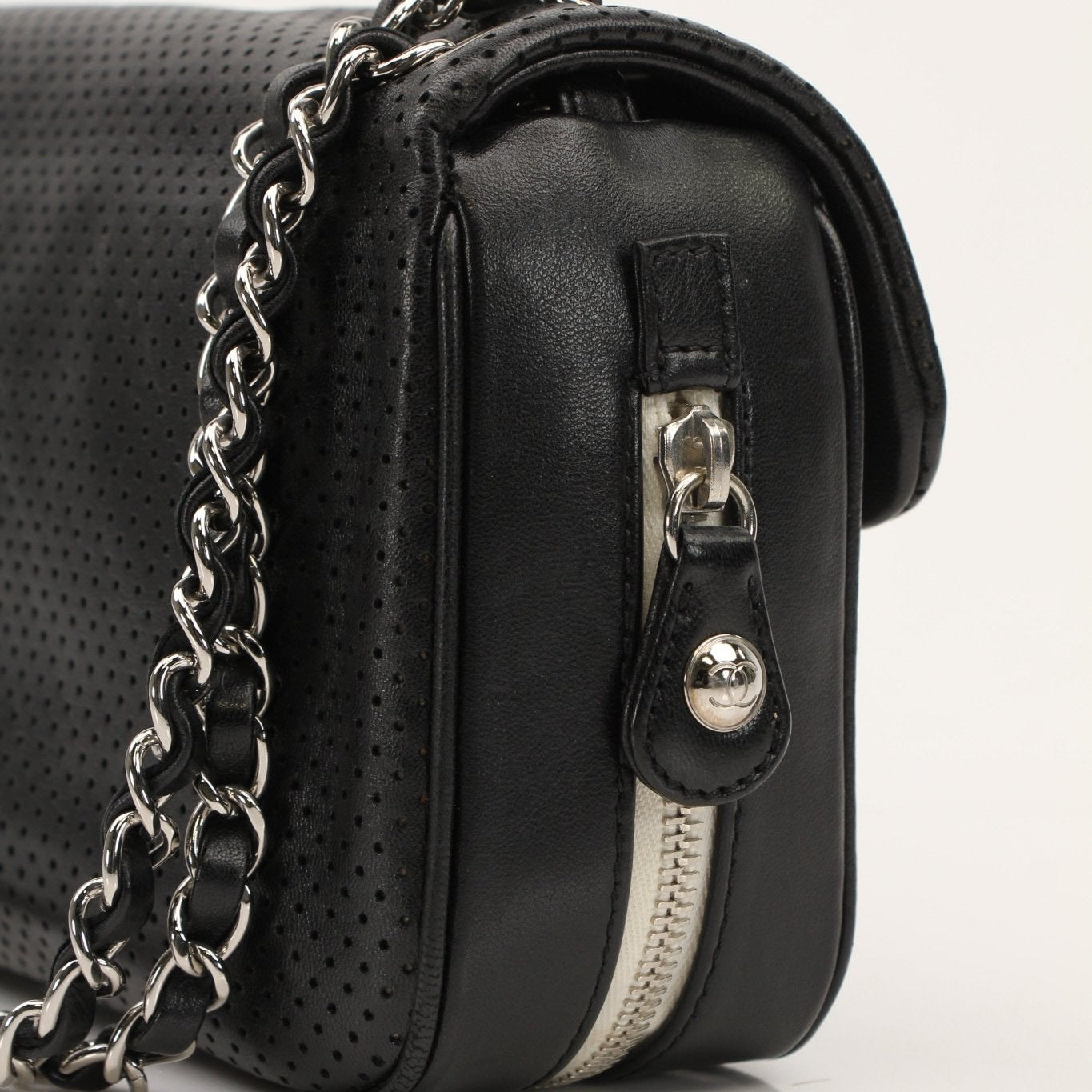 Gold & Beyond Chanel Baseball Spirit Flap Bag handbag with sporty design and gold accents, displayed on a neutral background.