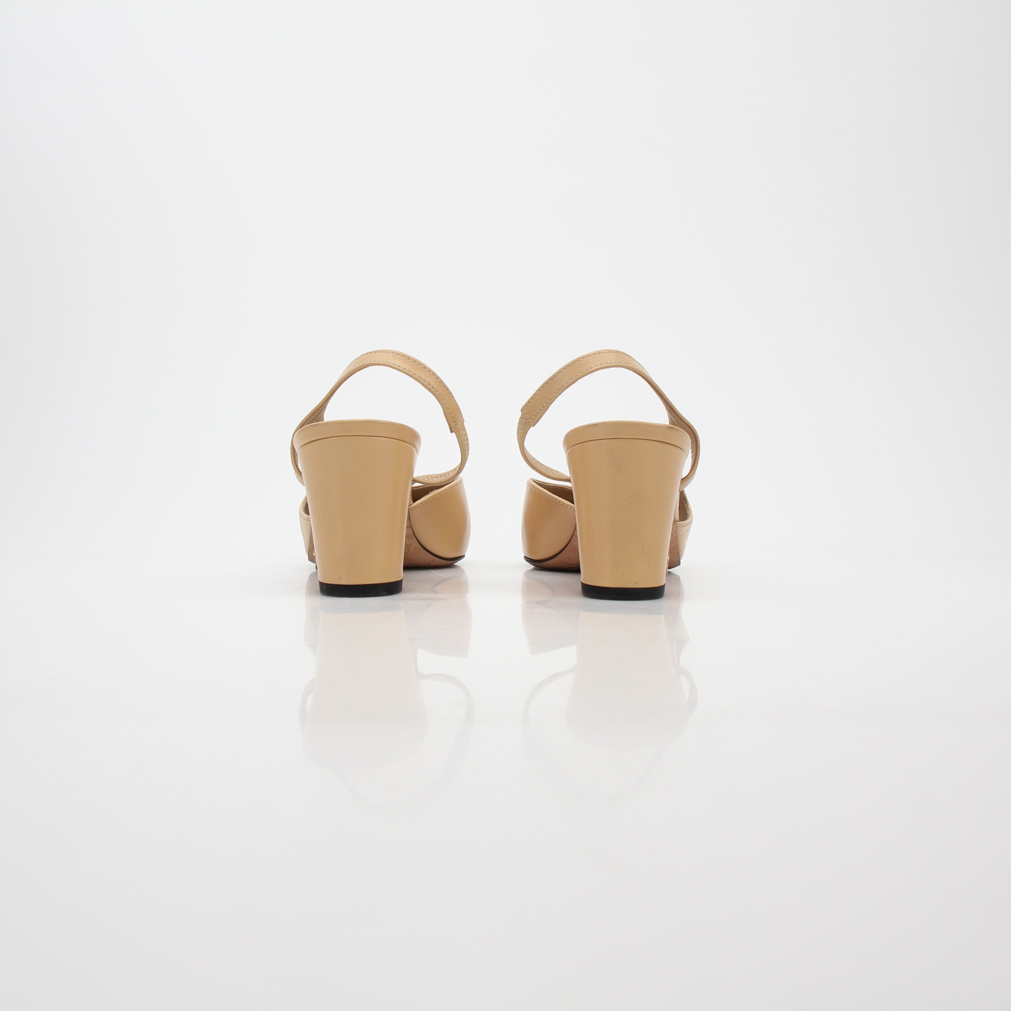 Chanel Beige and Black Cap-Toe Slingback Pumps