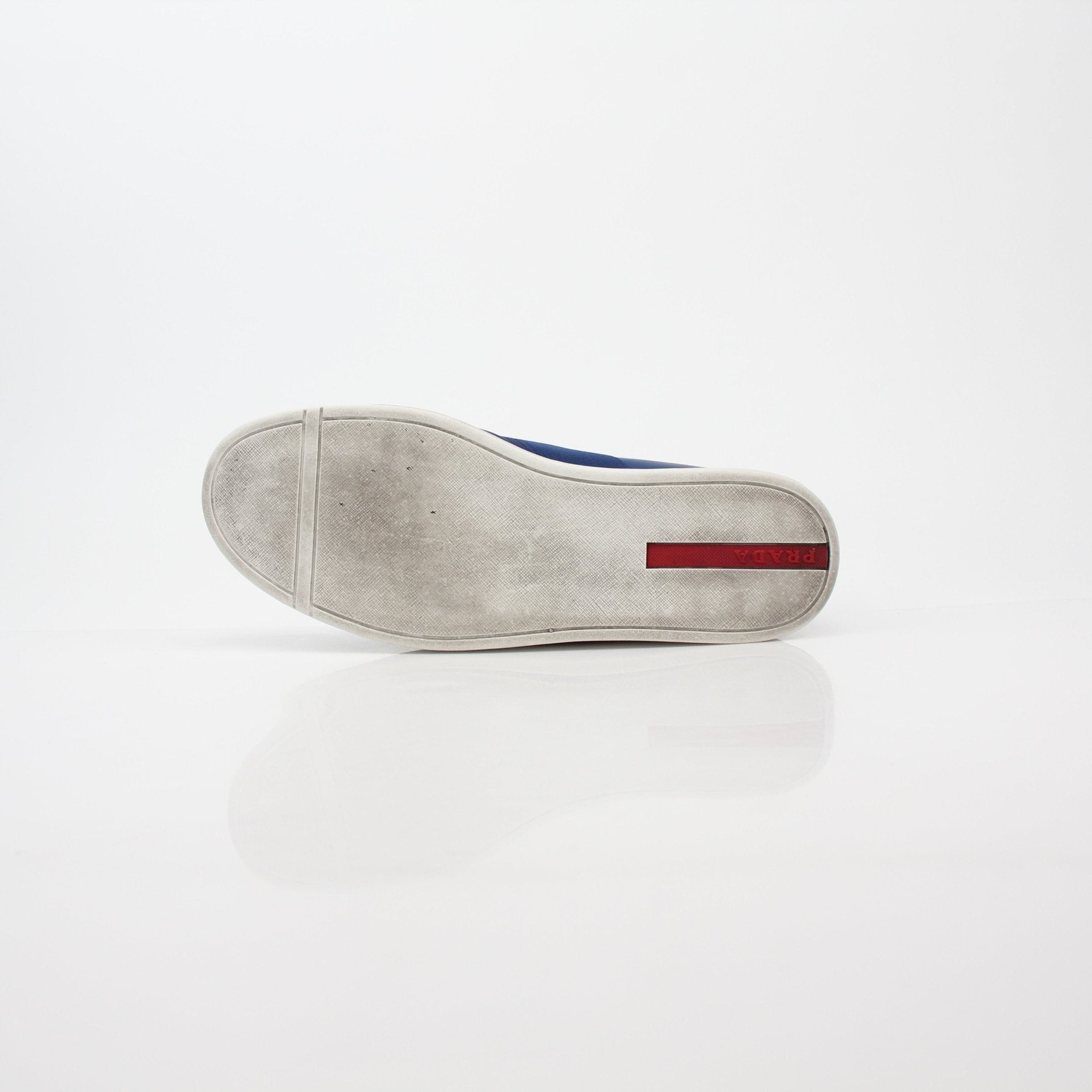 Prada blue nylon slip-on sneakers with white soles, lightweight shoes, casual footwear by Gold & Beyond.