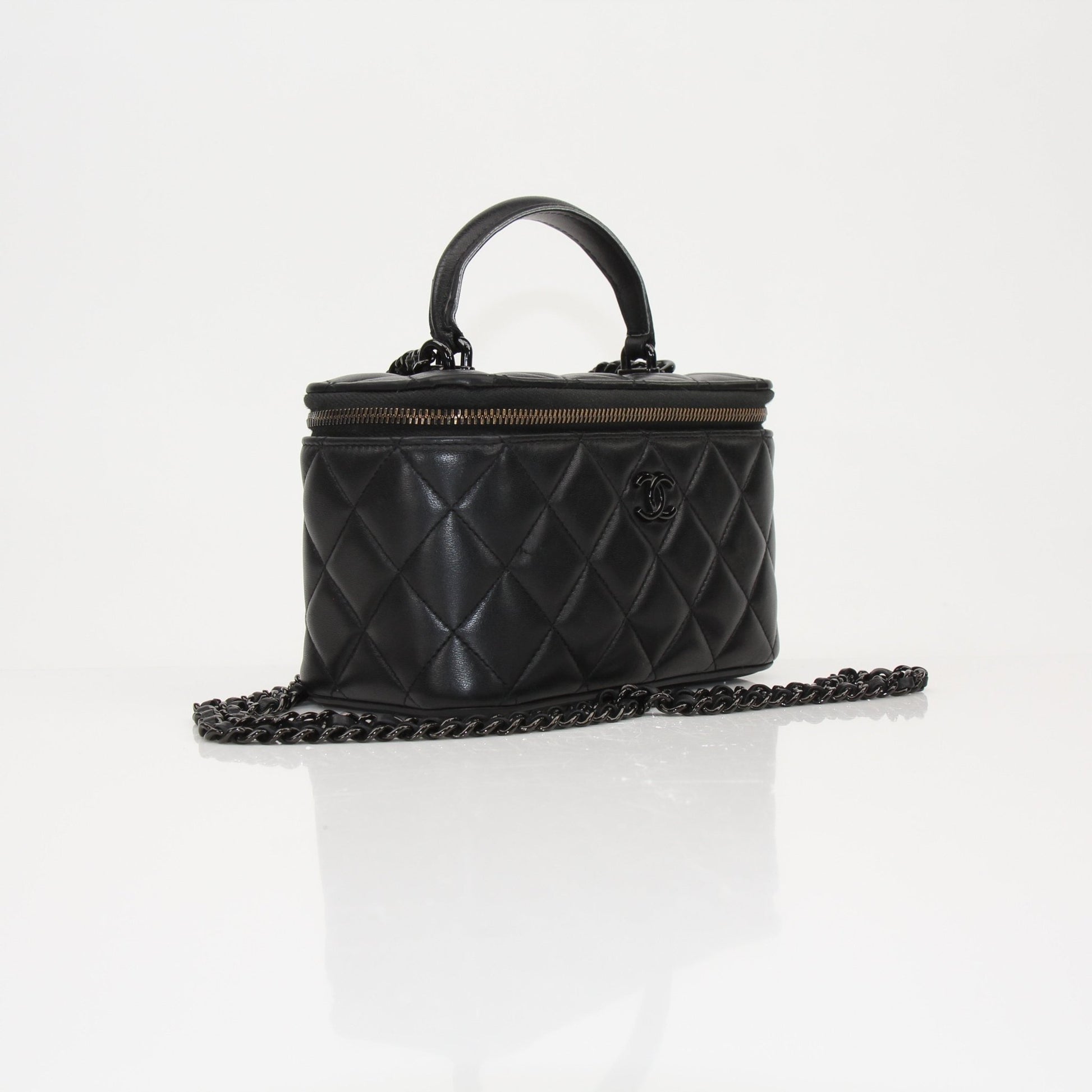 Gold & Beyond Chanel Vanity Bag for travel, featuring a sleek design with multiple compartments and elegant craftsmanship.