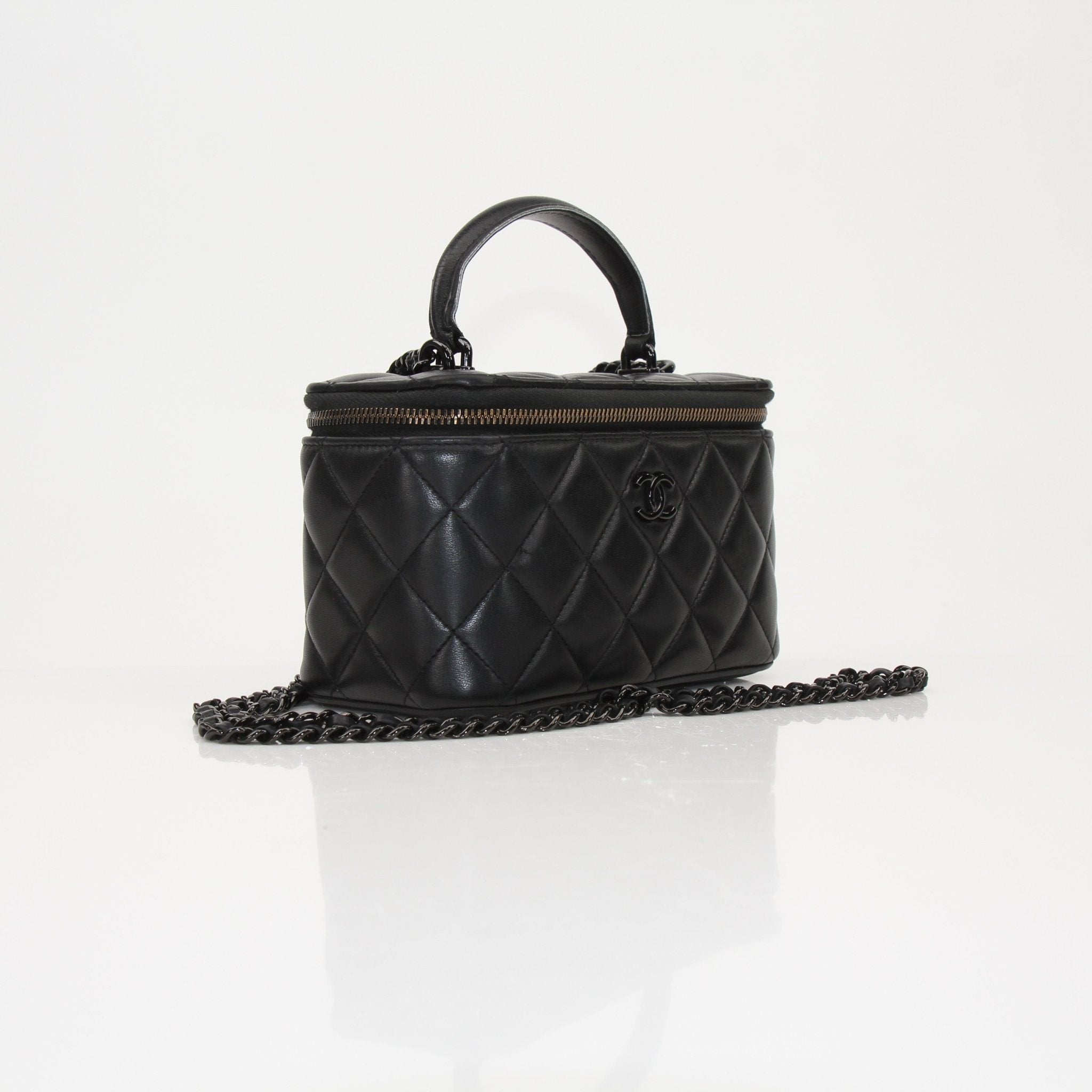 Gold & Beyond Chanel Vanity Bag for travel, featuring a sleek design, compact size, and luxurious appearance.