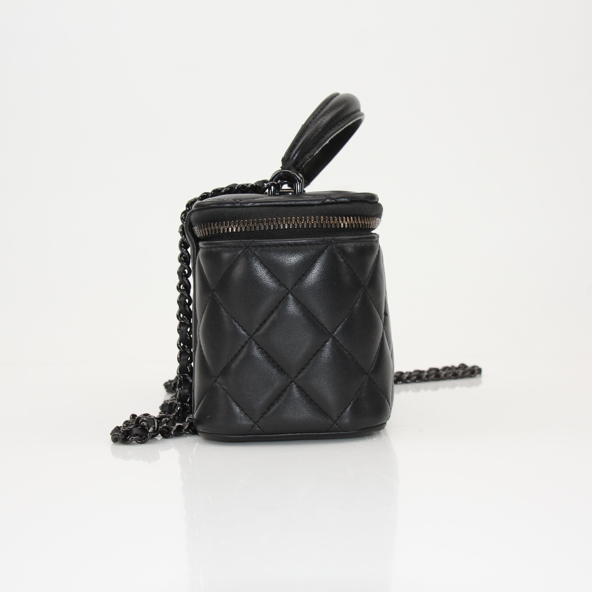 Gold & Beyond Chanel Vanity Bag for travel, featuring a sleek design and spacious interior for cosmetics and essentials.