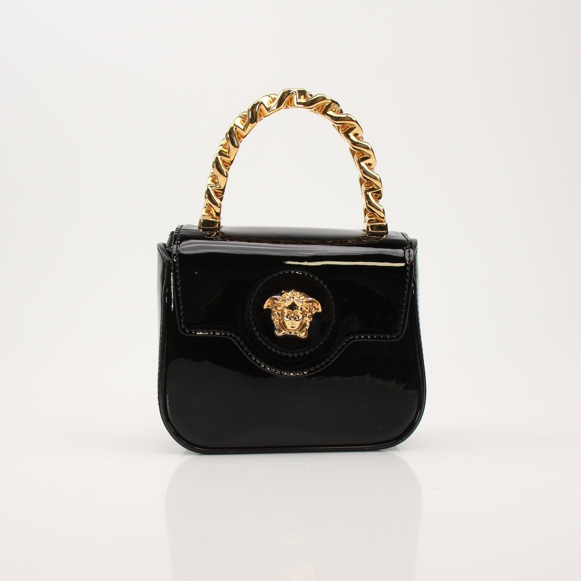 Gold & Beyond Versace La Medusa Mini Handbag with gold hardware and signature Medusa logo, stylish and compact accessory.