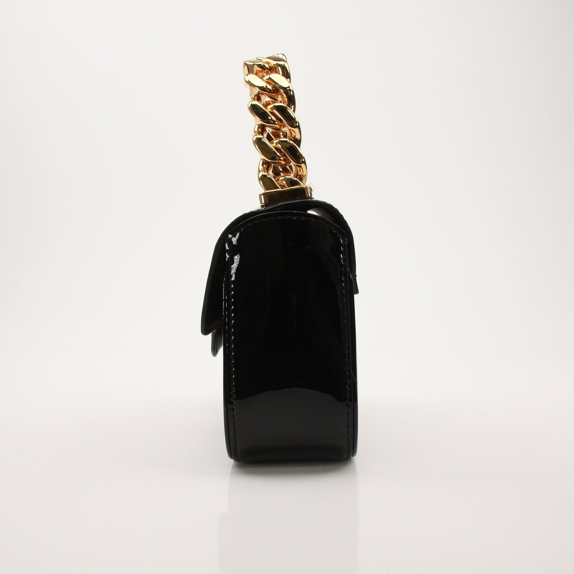 Gold & Beyond Versace La Medusa Mini Handbag with gold chain strap and iconic Medusa logo detail on black leather.