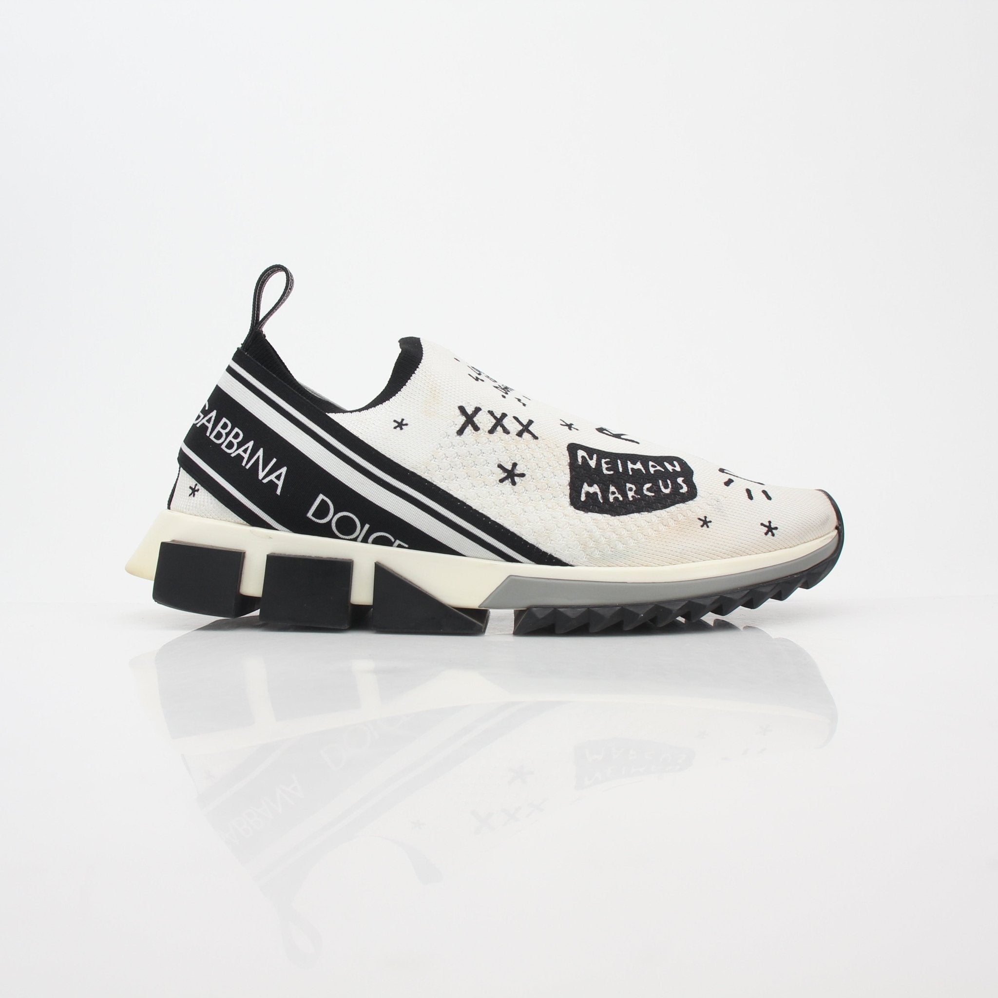 Gold & Beyond Dolce & Gabbana white Sorrento graffiti print sneakers with stylish design and colorful artwork on the shoes.