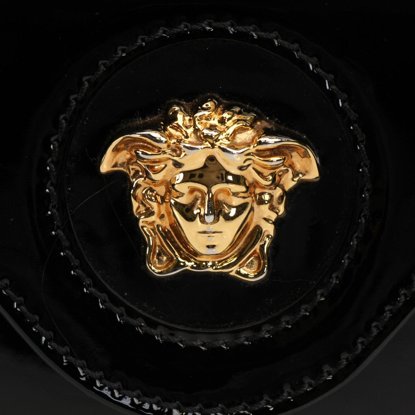 Gold & Beyond Versace La Medusa Mini Handbag featuring a sleek design and iconic Medusa logo on the front.