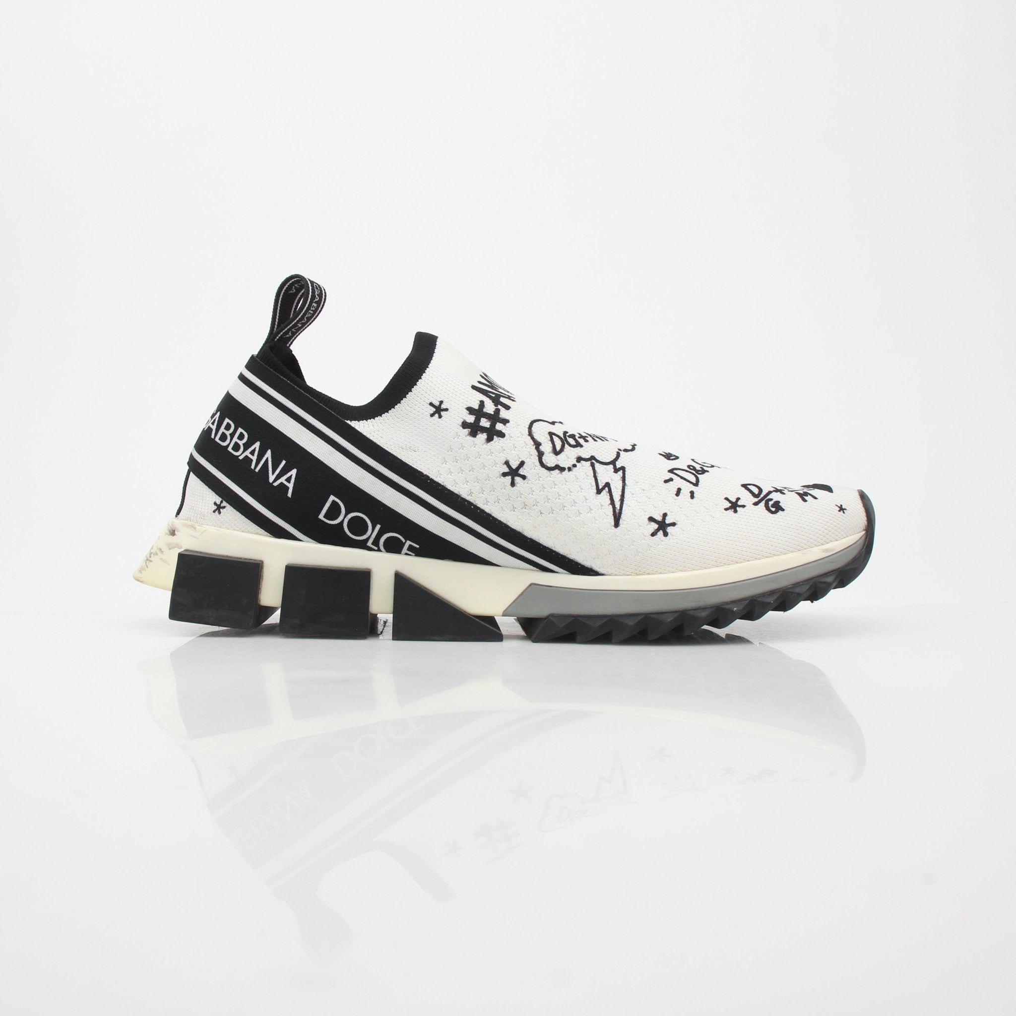 Gold & Beyond Dolce & Gabbana white Sorrento graffiti print sneakers with colorful design and lace-up closure.