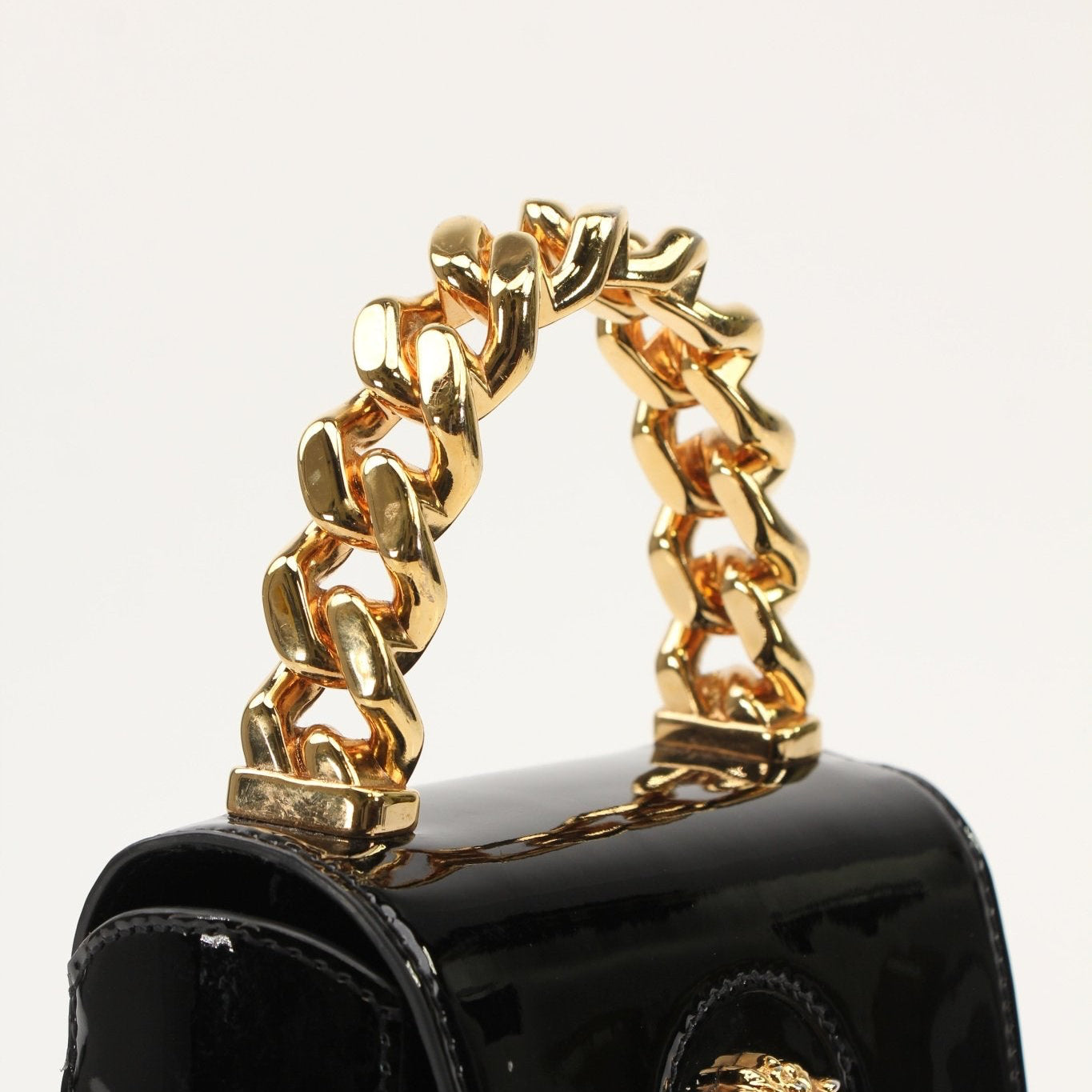 Gold & Beyond Versace La Medusa Mini Handbag with gold-tone hardware and signature Medusa logo detail.
