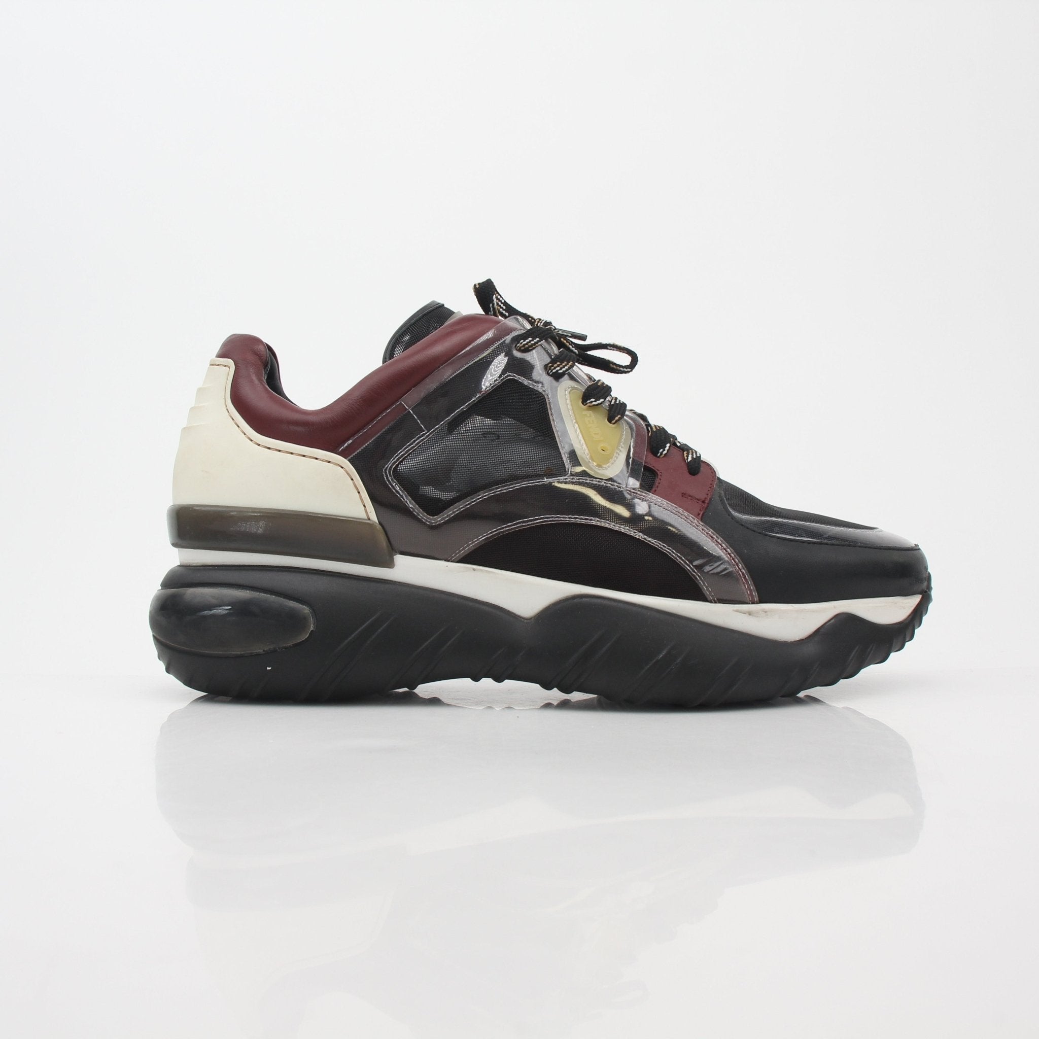 Fendi Fancy black and burgundy mixed-material sneakers with stylish design, showcasing the shoes' unique color and texture details.