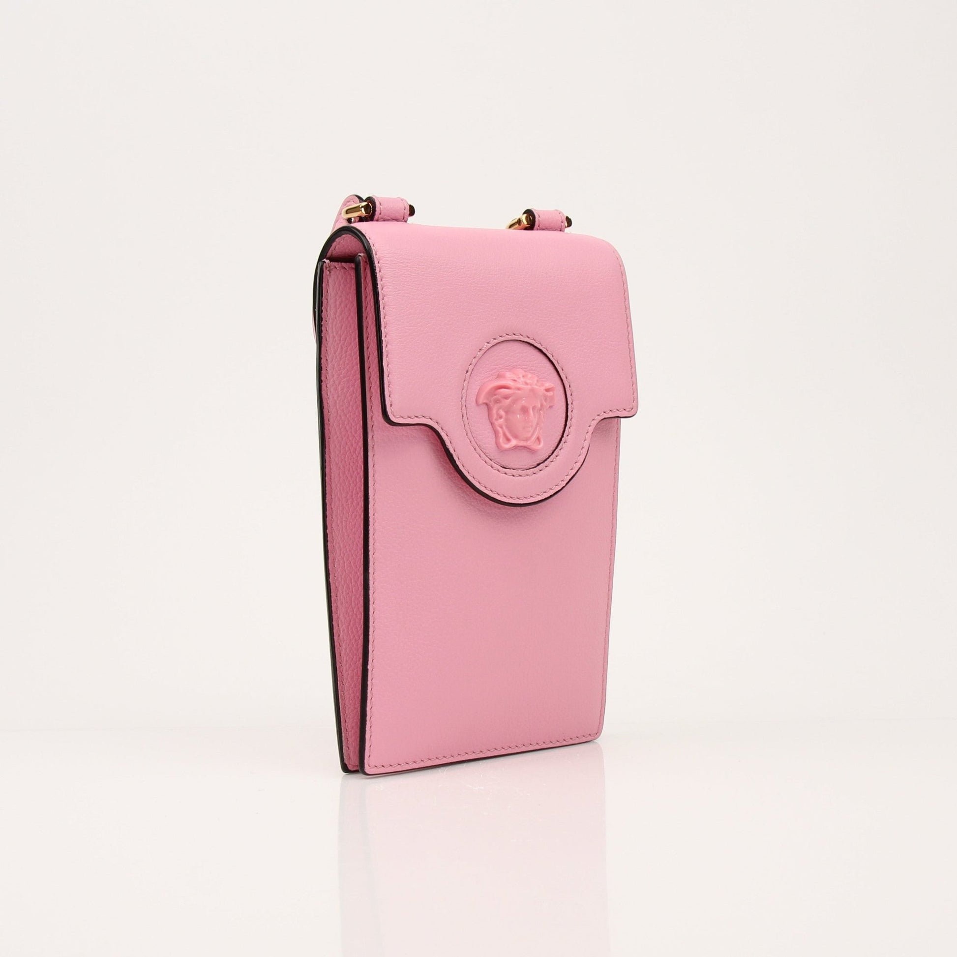 Gold & Beyond Versace La Medusa iPhone case handbag with Medusa logo design and elegant gold accents.
