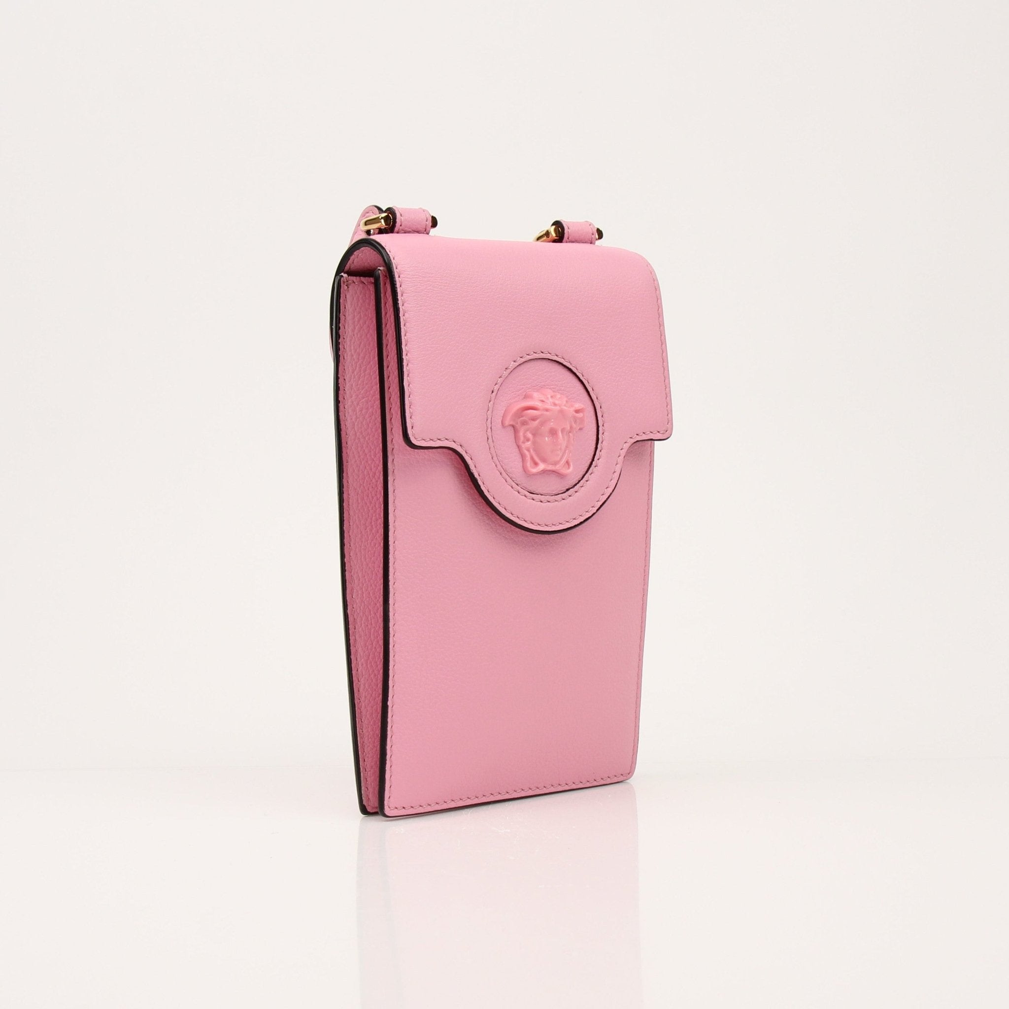Gold & Beyond Versace La Medusa iPhone case handbag with Medusa logo design and elegant gold accents.