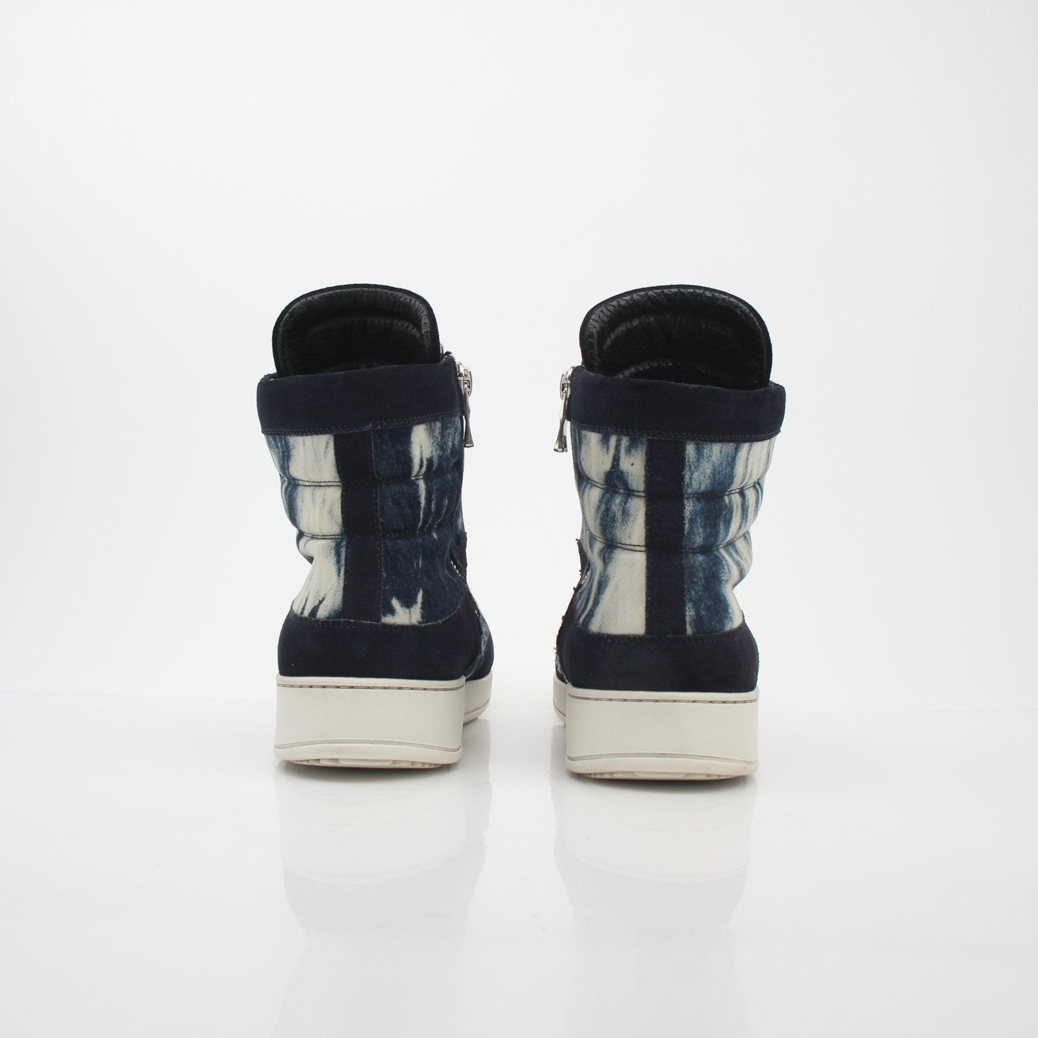 Gold & Beyond Balmain blue tie-dye denim high-top sneakers with white rubber soles and stylish laces.