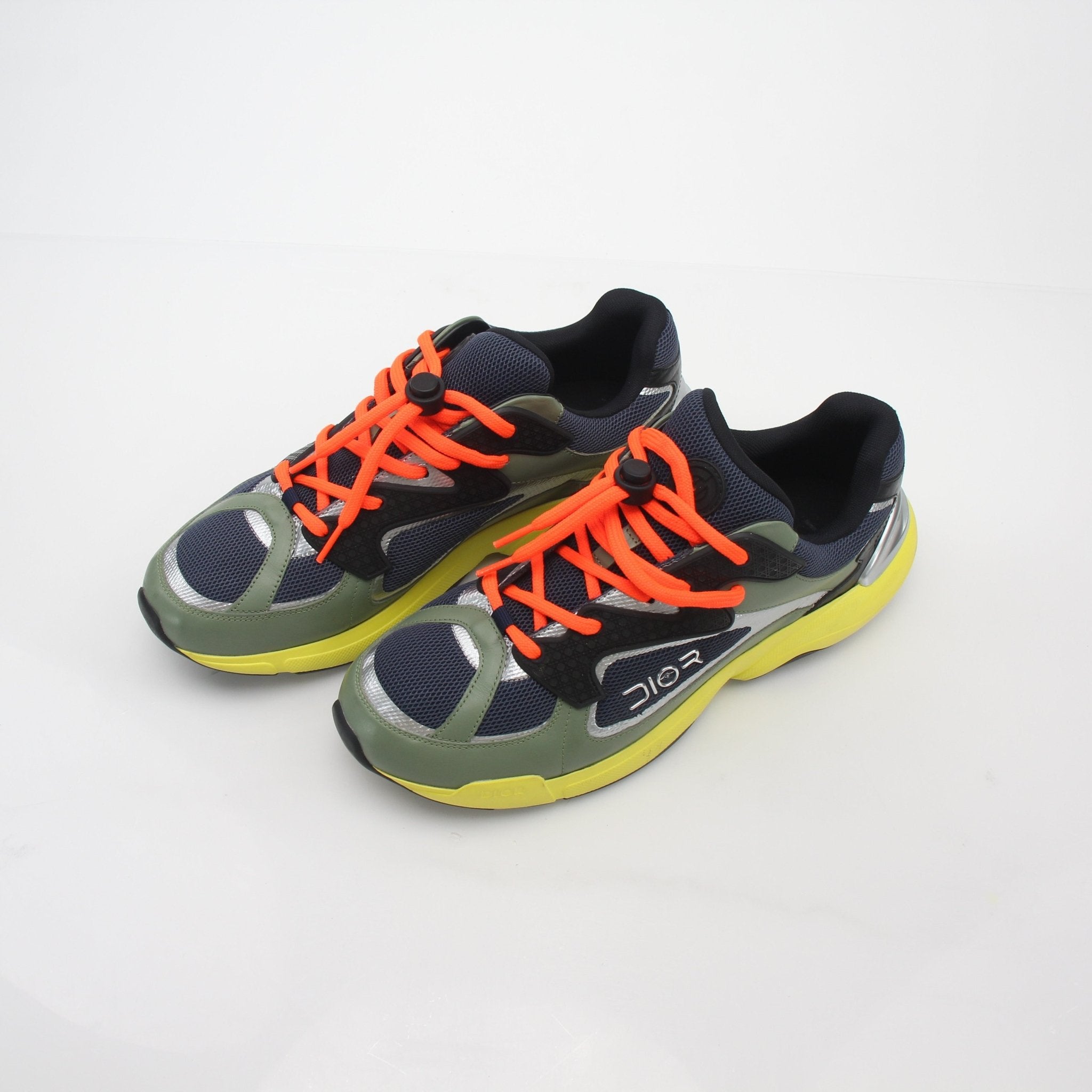 Christian Dior B24 Sotayama multicolor low-top sneakers with stylish design and colorful details, worn on feet.