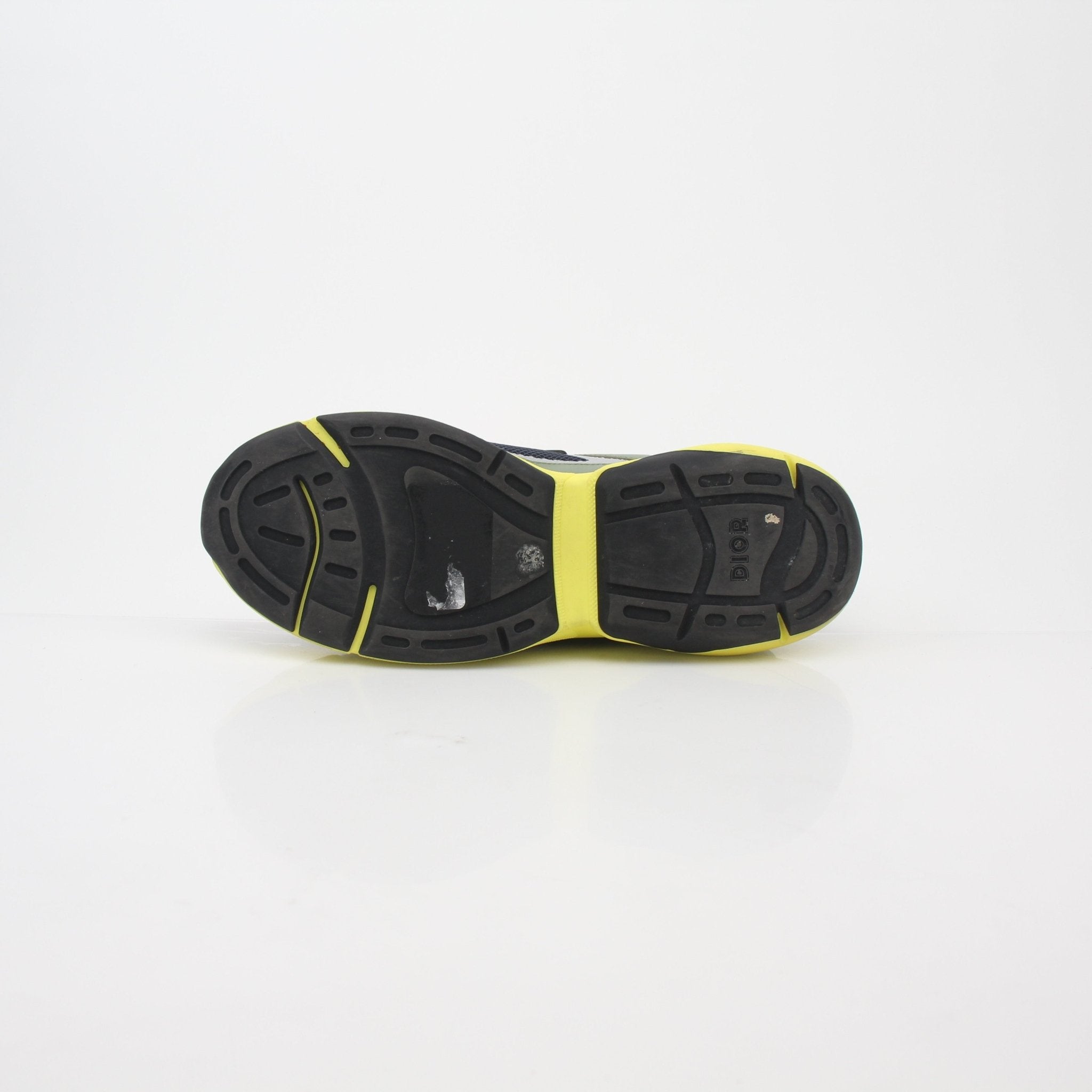 Christian Dior B24 Sotayama multicolor low-top sneakers with vibrant design and white rubber soles, displayed on a plain background.