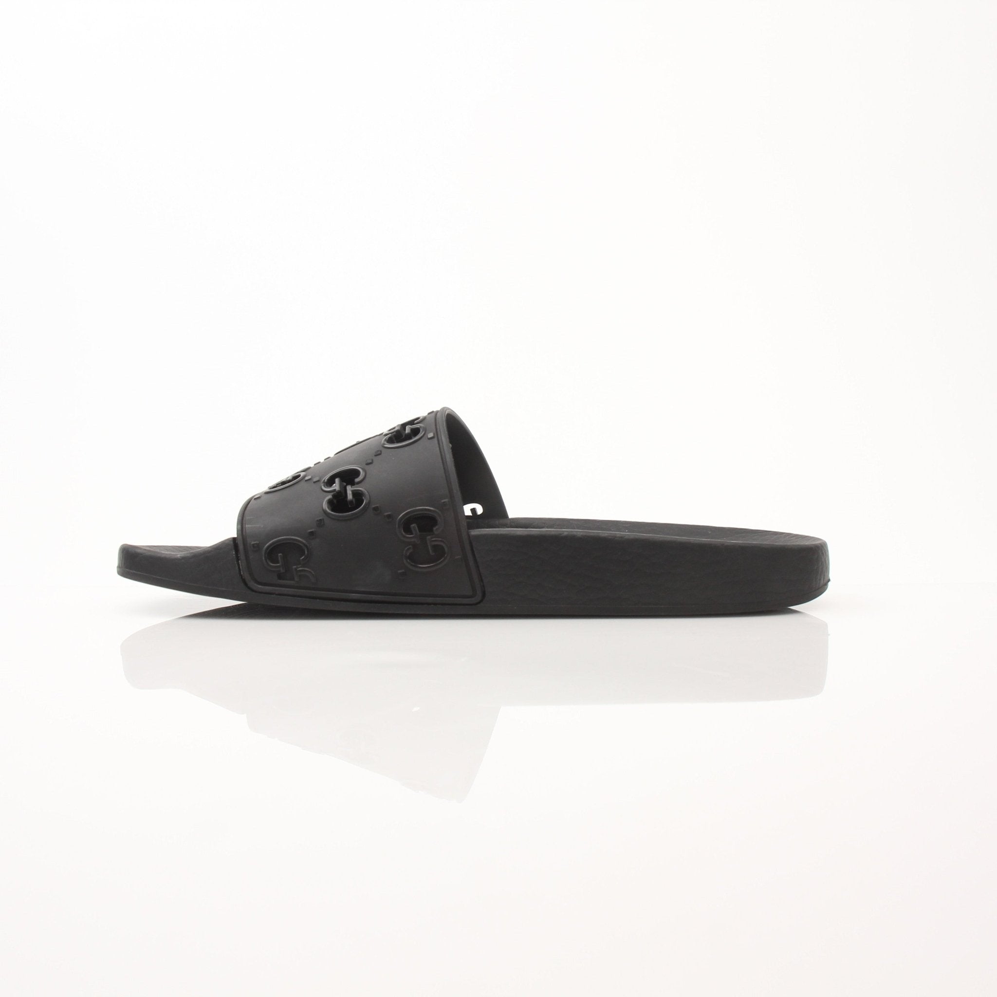 Gold & Beyond Gucci Pursuit Slides shoes featuring sleek design and comfortable slip-on style, shown from a side angle.