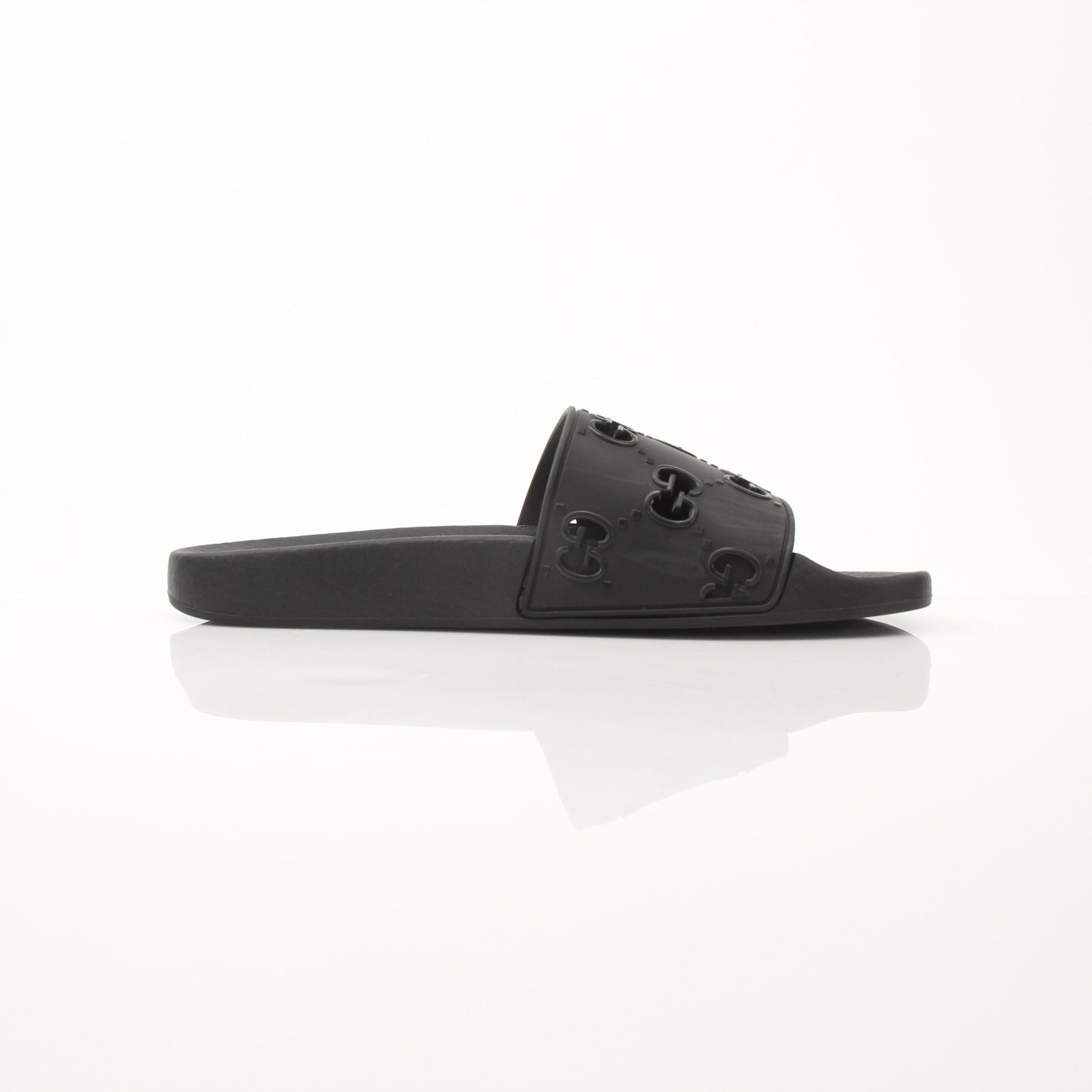 Gold & Beyond Gucci Pursuit Slides shoes featuring sleek design, open-toe style, and branded logo on the straps.