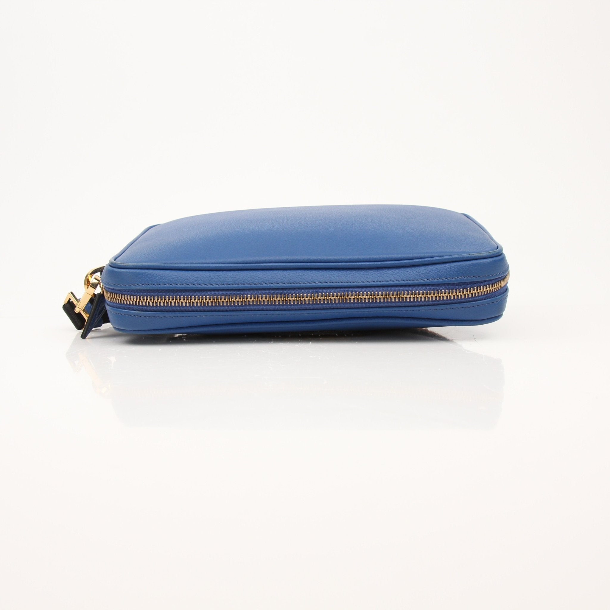 Large blue Versace men's wristlet handbag by Gold & Beyond, featuring stylish design and wrist strap detail.