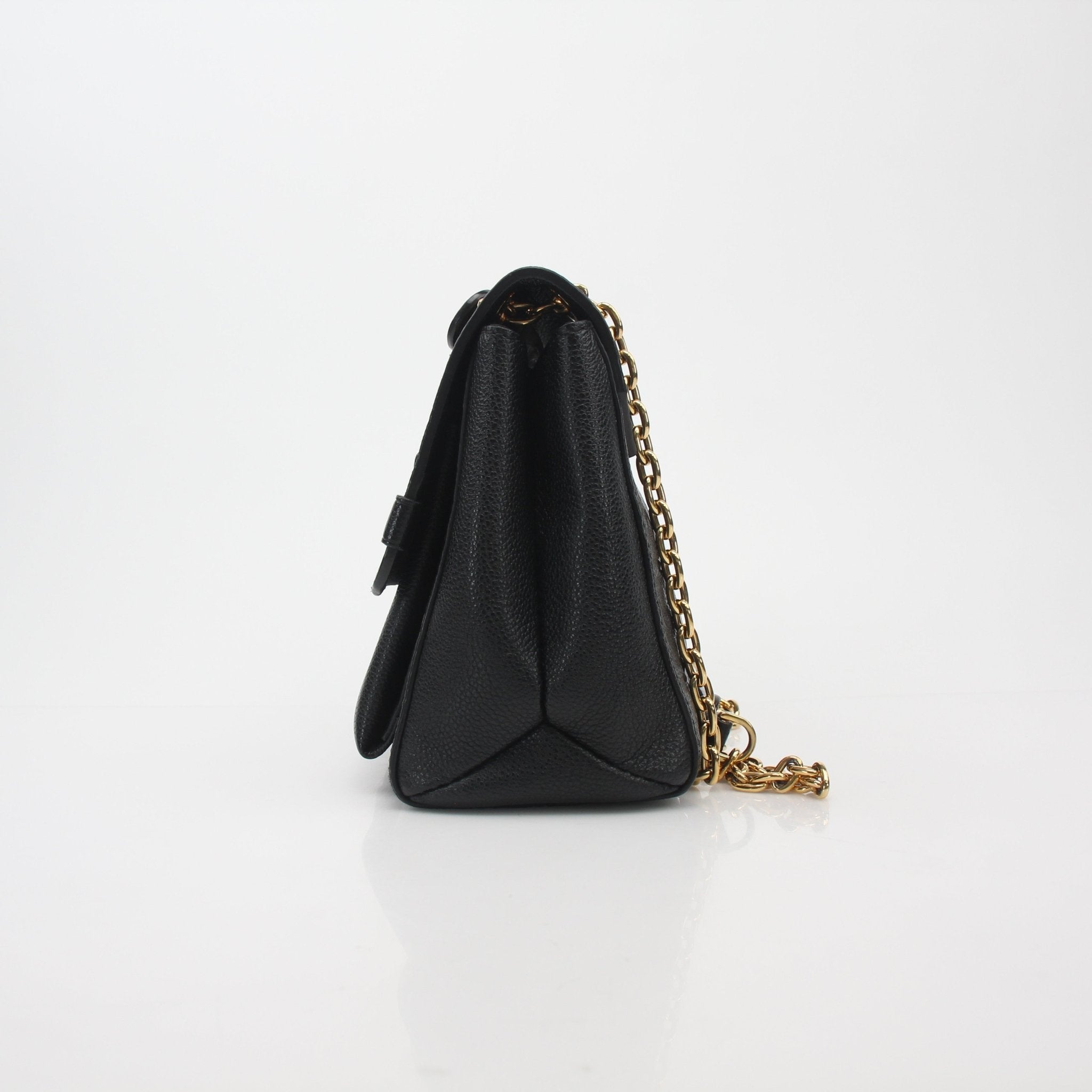 Black Louis Vuitton Monogram Empreinte Vavin MM shoulder handbag with gold hardware, stylish and spacious for everyday use.