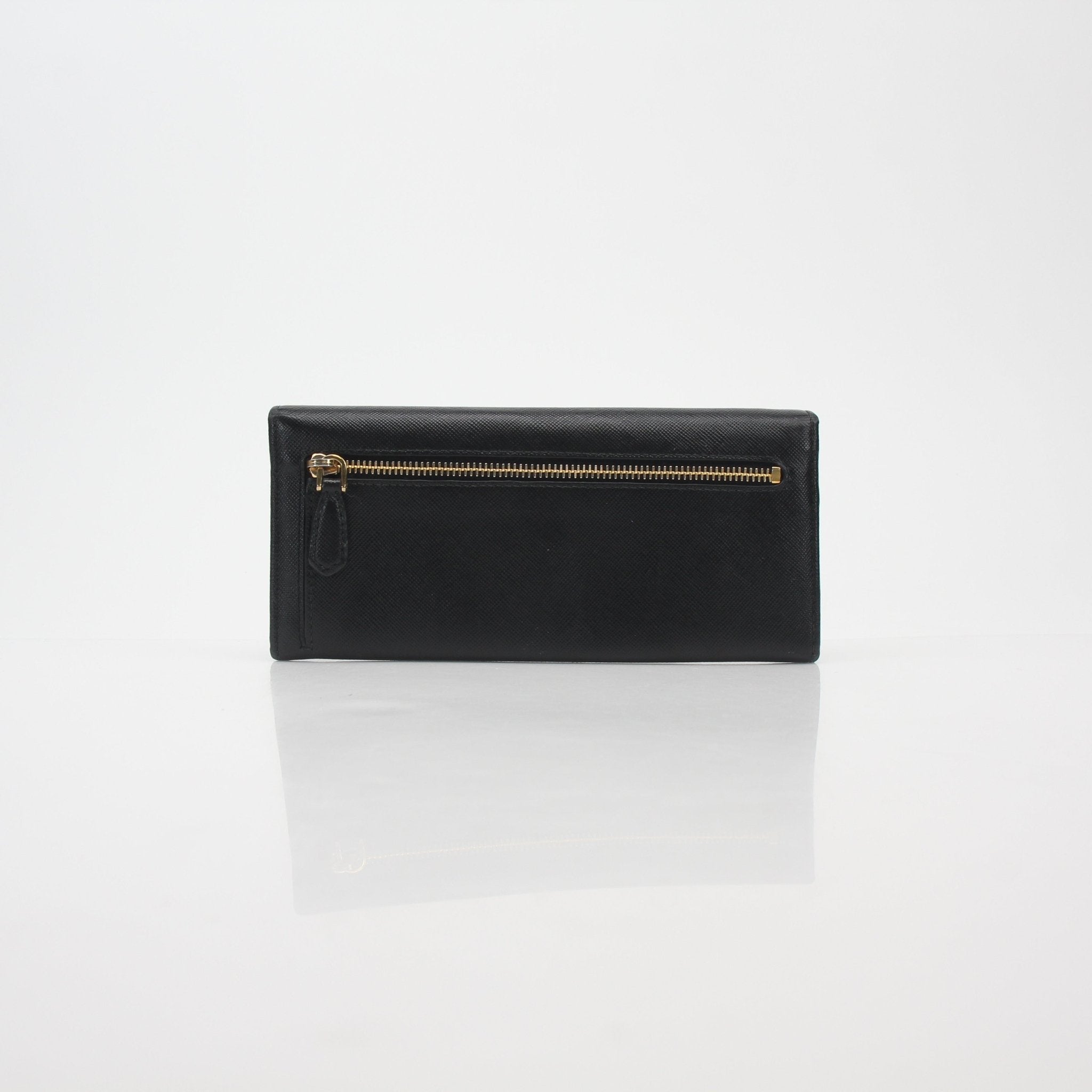 Black Prada Saffiano leather continental wallet with gold accents, featuring multiple card slots and a sleek, structured design.