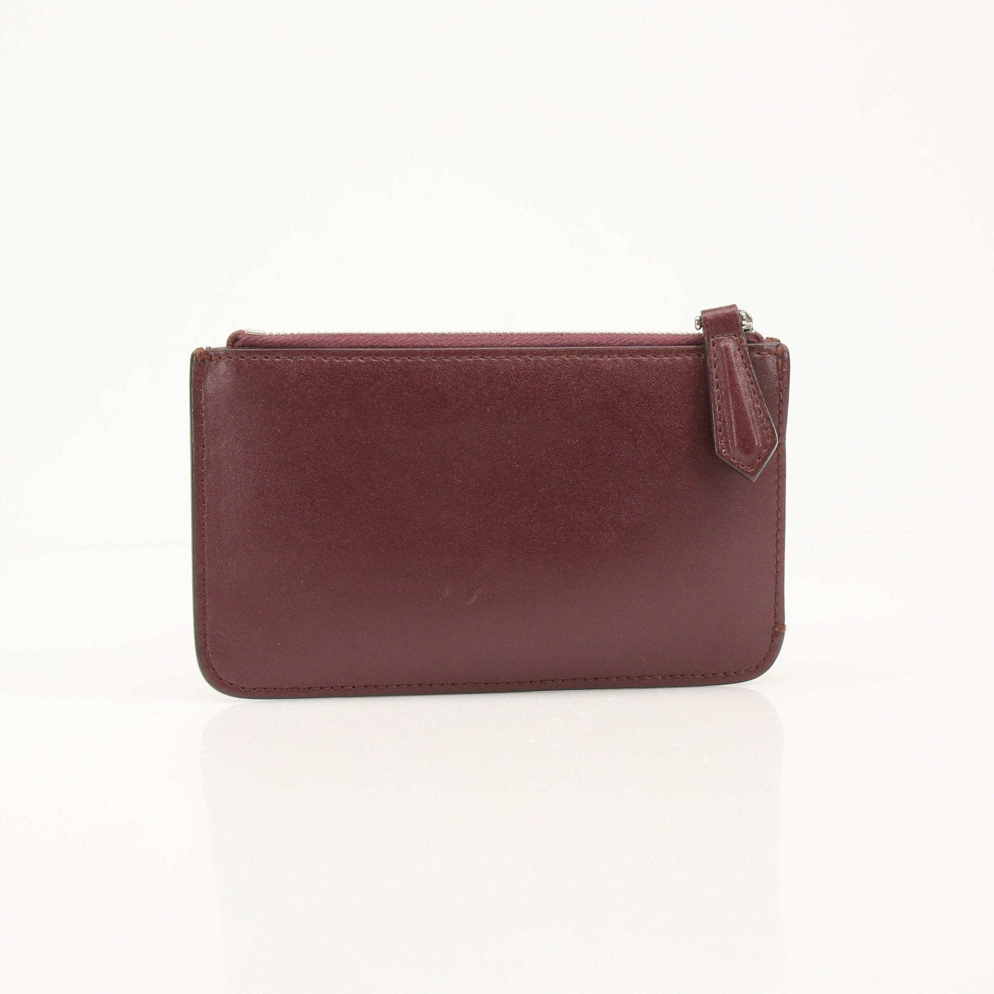 Purple Fendi keychain pouch wallet with gold hardware, featuring a compact design and visible Fendi branding.