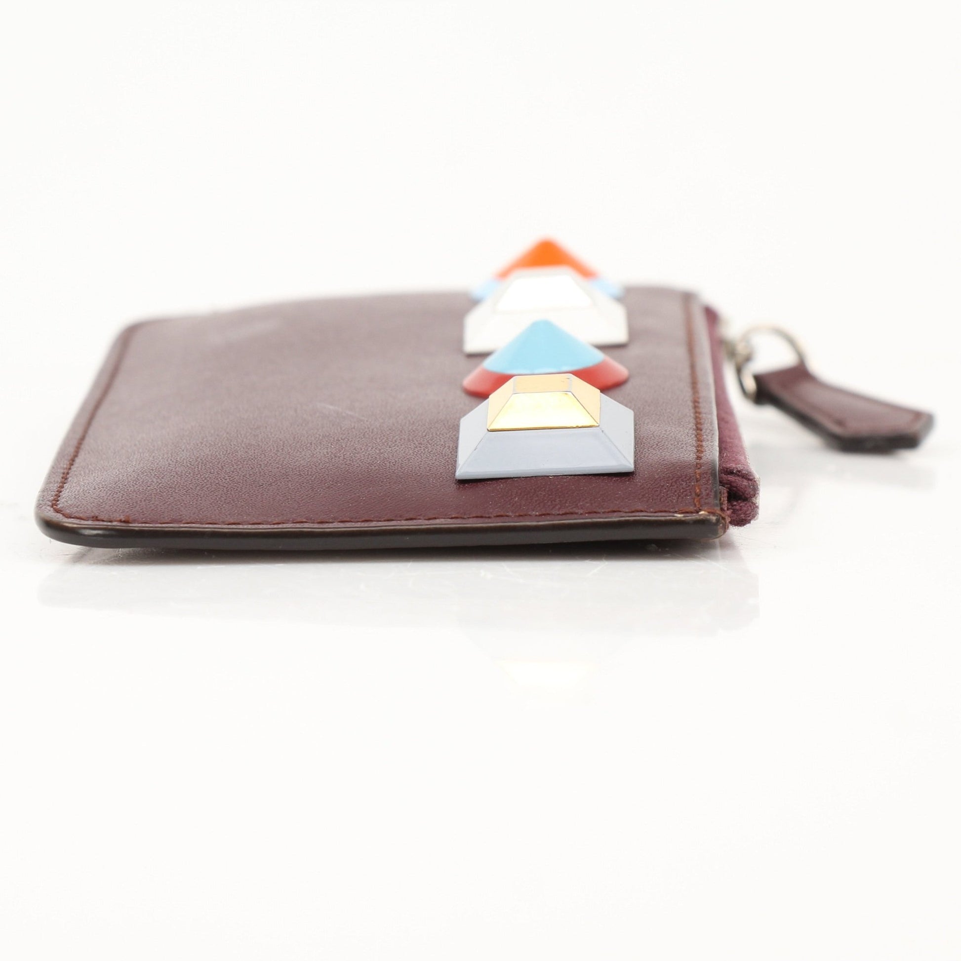Gold & Beyond purple Fendi keychain pouch wallet with zip closure and gold hardware, attached to a keyring.
