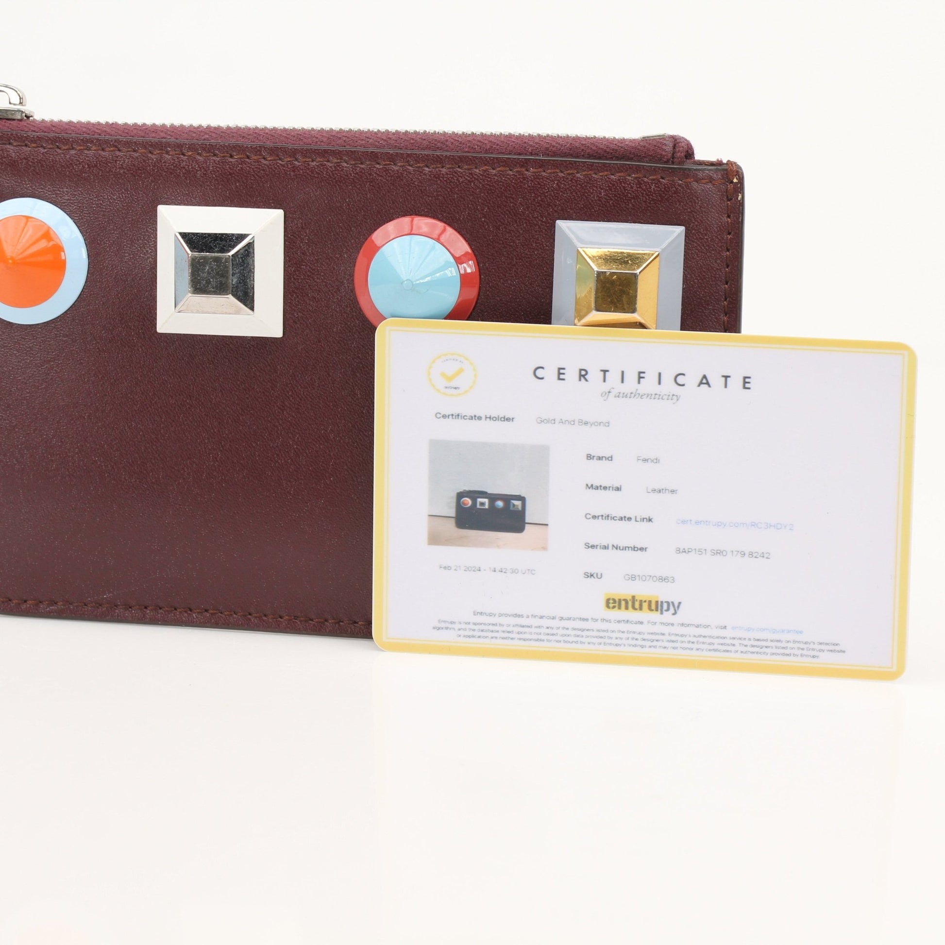 Fendi purple keychain pouch wallet with gold accents and attached keyring, compact and stylish accessory.