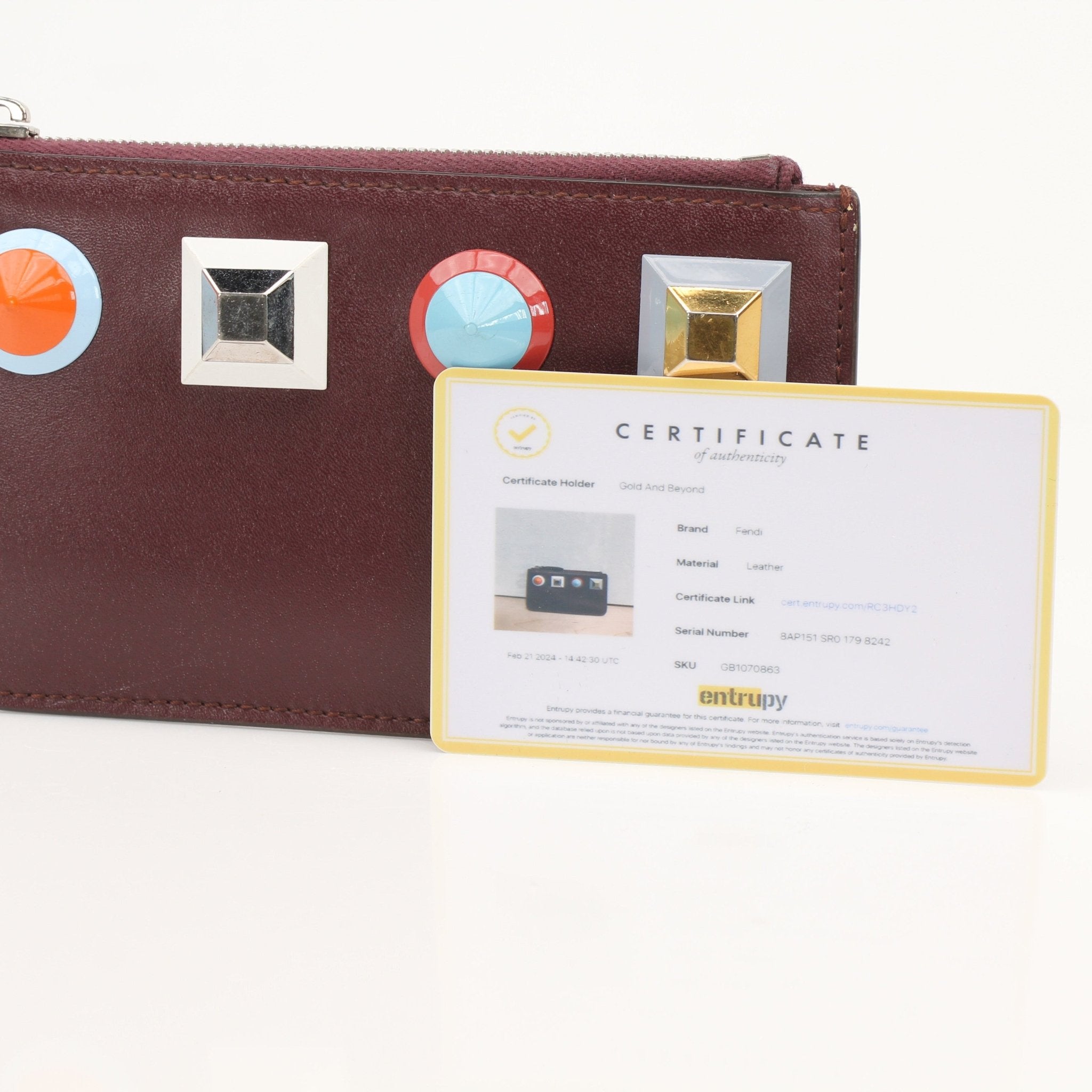 Fendi purple keychain pouch wallet with gold accents and attached keyring, compact and stylish accessory.