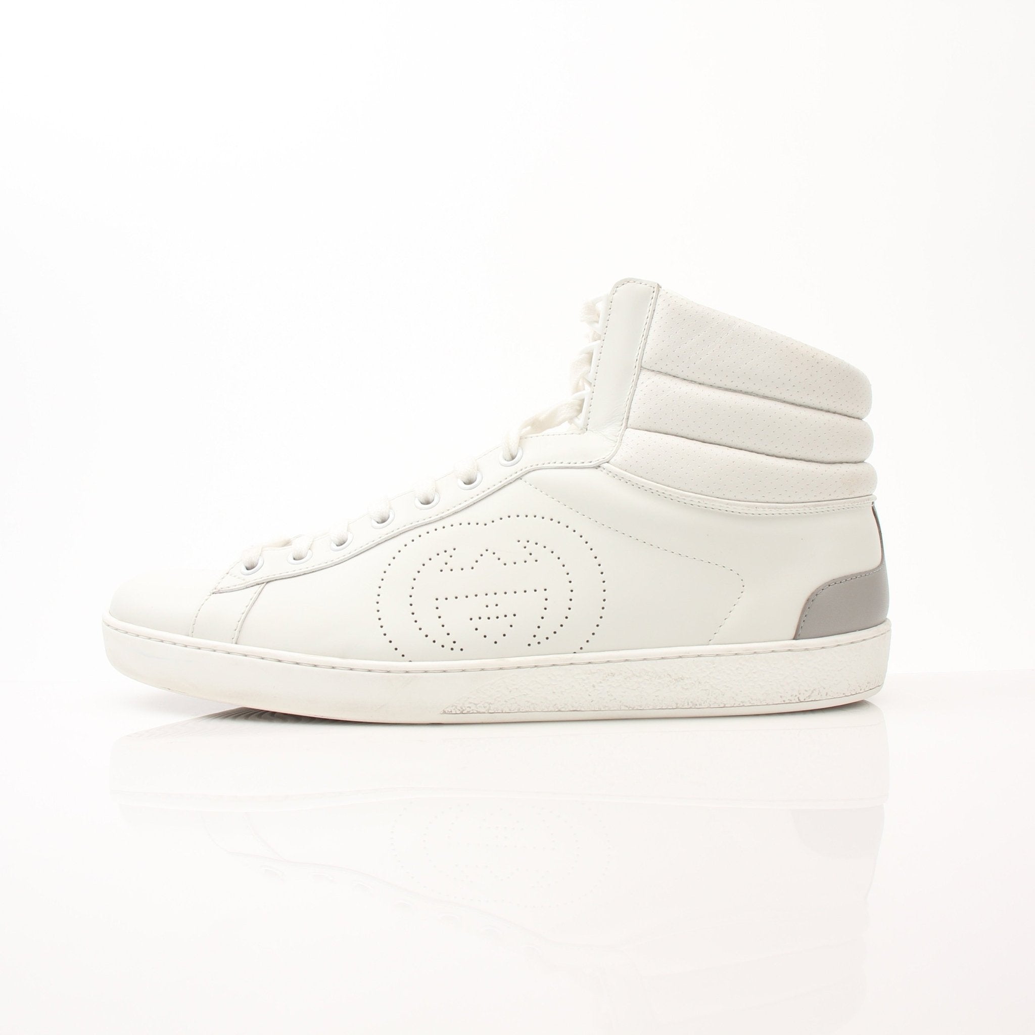 Gold & Beyond Gucci Ace high top sneakers with white leather and signature green and red stripe detail, stylish shoes for casual wear.