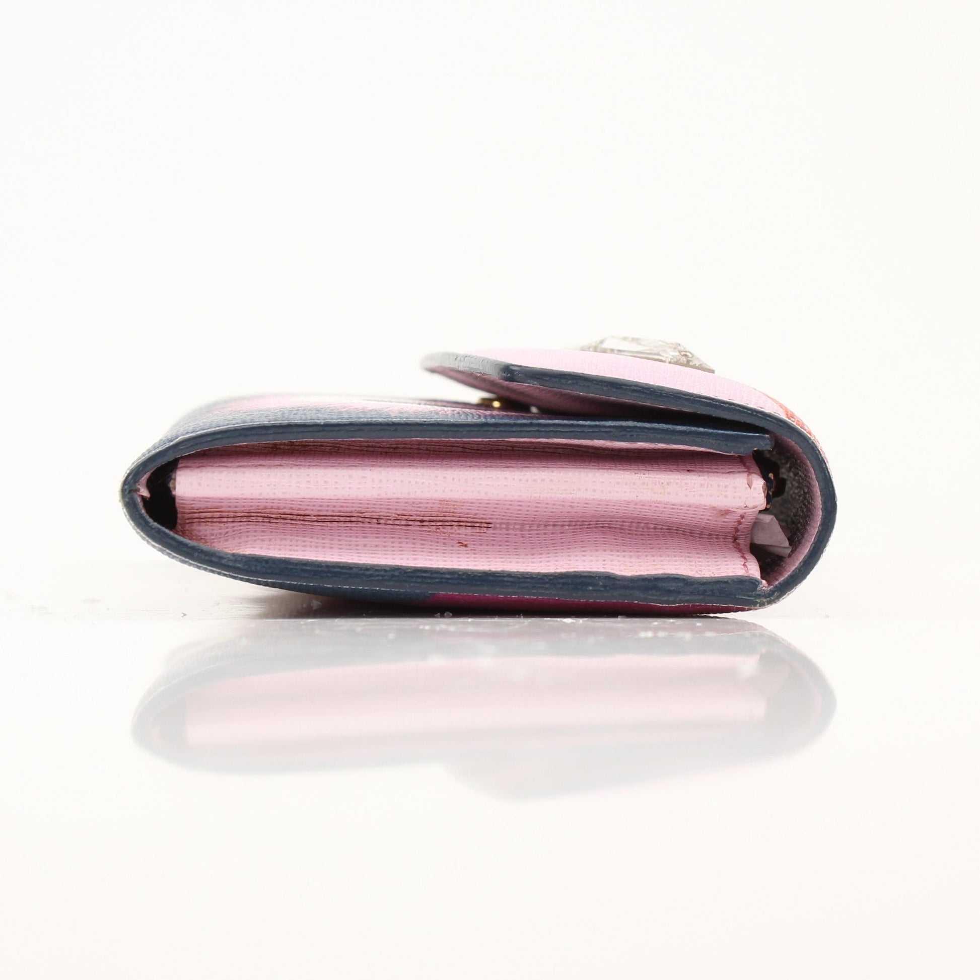 Fendi Monster Continental Wallet by Gold & Beyond, featuring iconic monster design and multiple card slots in a sleek wallet.