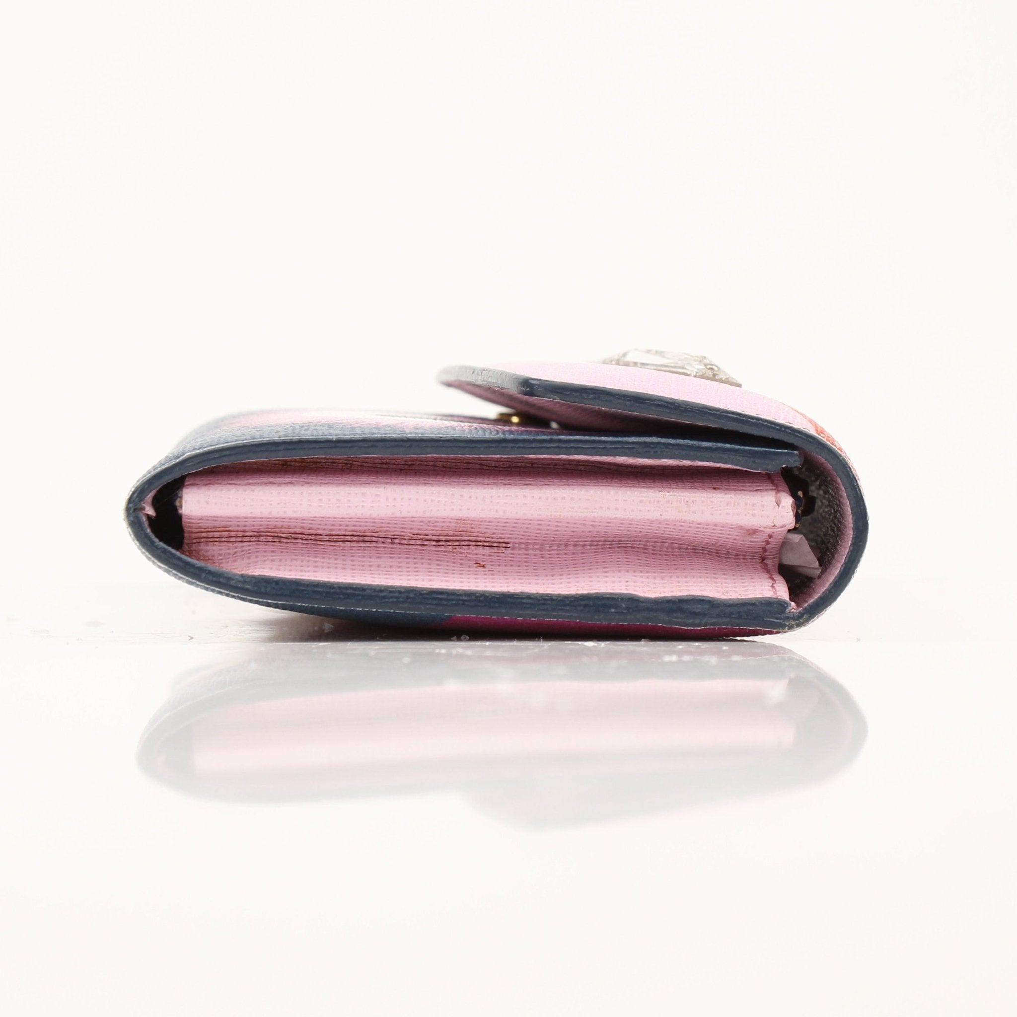 Fendi Monster Continental Wallet by Gold & Beyond, featuring iconic monster design and multiple card slots in a sleek wallet.